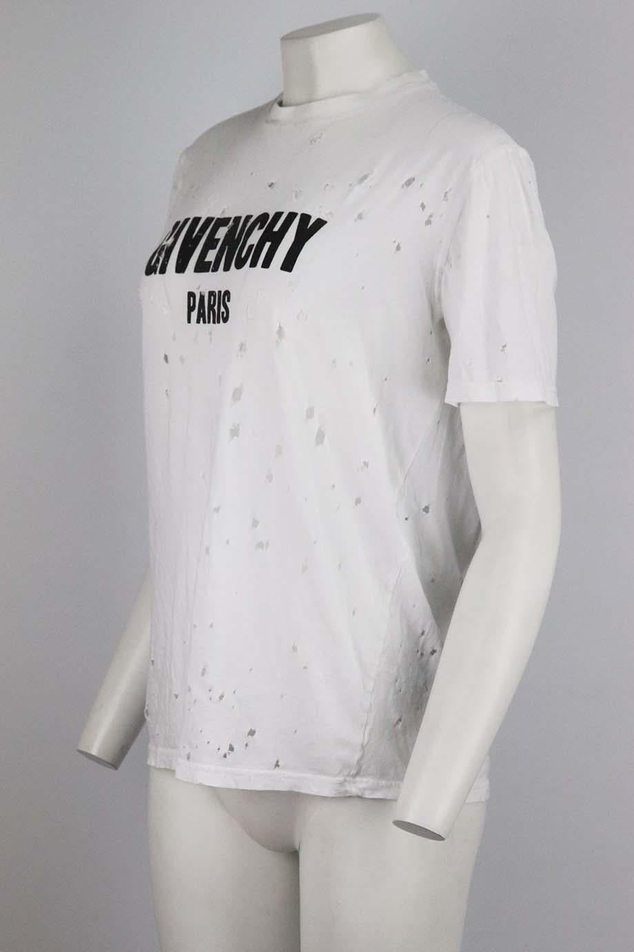 This T-shirt by Givenchy is printed with a bold logo at the front, it's cut from soft cotton-jersey in a slim silhouette and has a classic crew neckline with intentional distressing throughout. White cotton-jersey. Slips on. 100% Cotton; fabric2: