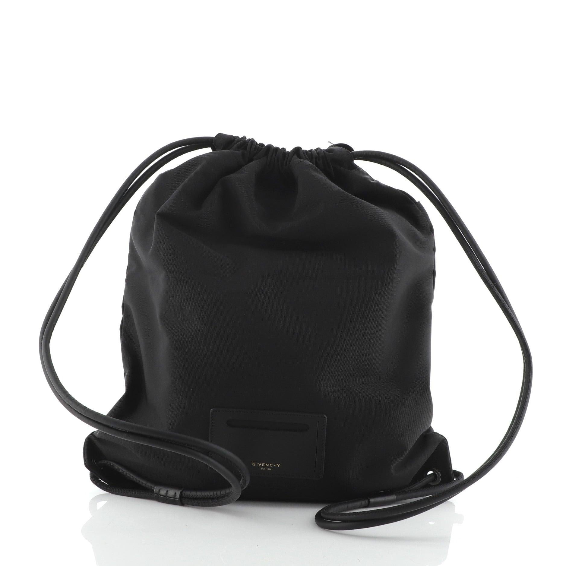 Givenchy Drawstring Backpack Nylon Large
Black Nylon

Condition Details: Minor wear on exterior and in interior, scratches on hardware.

51921MSC

Height 18