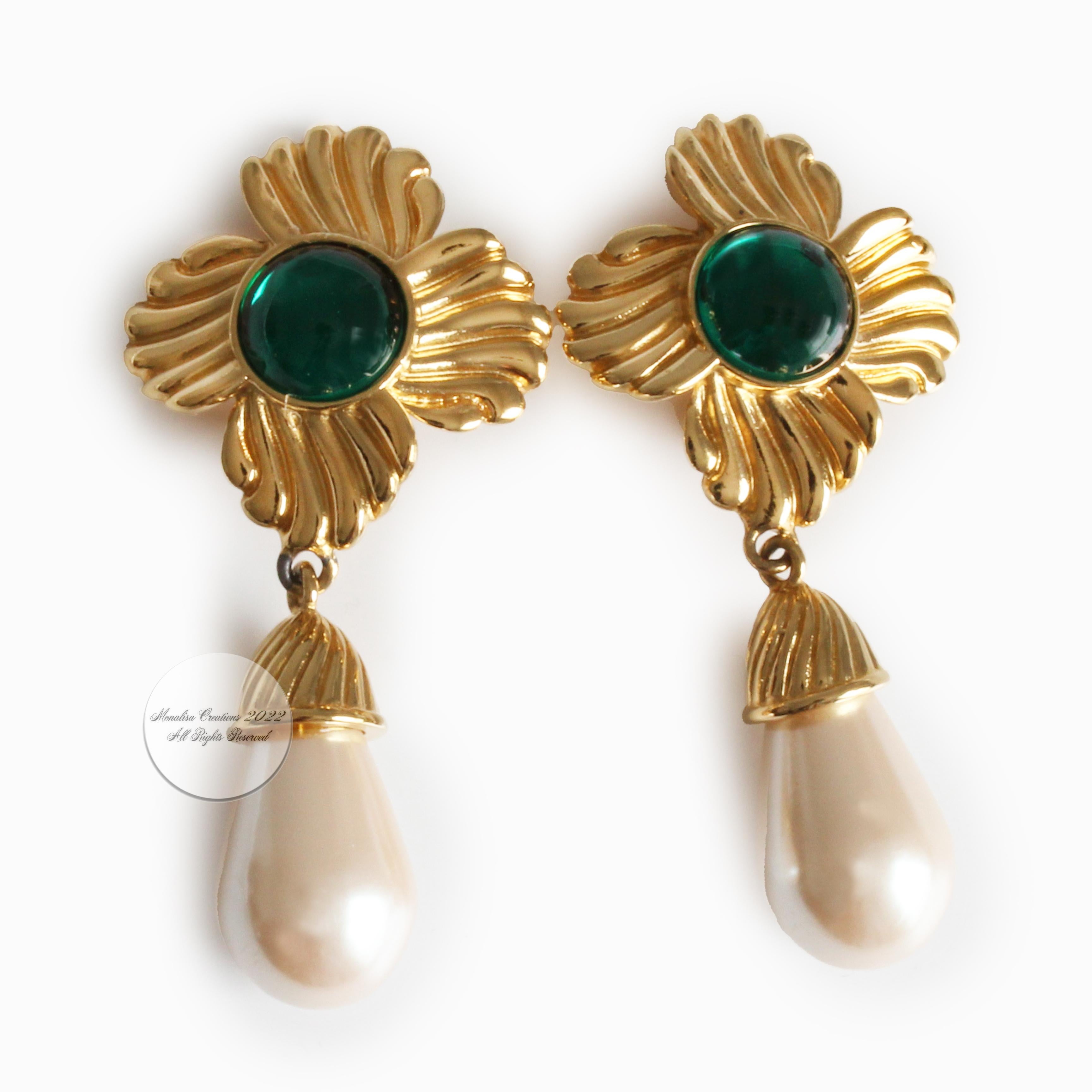 Preowned vintage Givenchy statement earrings, likely made in the late 80s.  Gold metal settings with green glass cabochon centers and tear-shaped glass pearl dangles - so chic!  Great statement earrings that are guaranteed to generate compliments