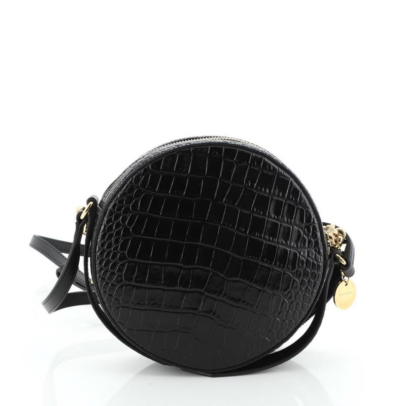 black round crossbody bag
