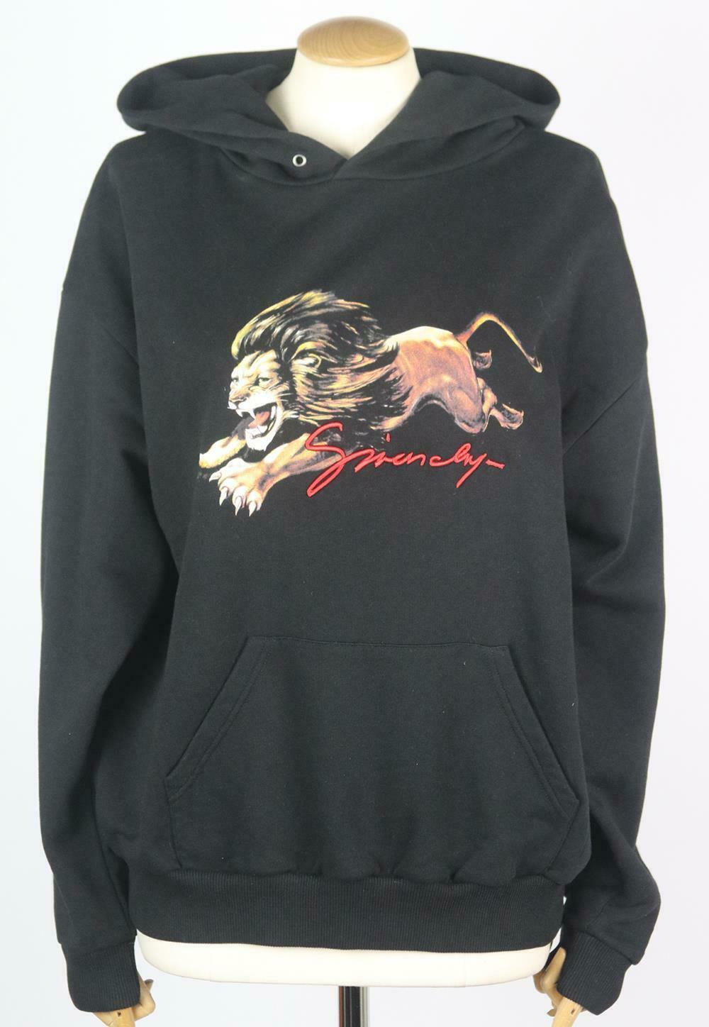Givenchy' hoodie is printed with a roaring lion on the front, it's made from black cotton-jersey and cut for a loose fit and finished with the brand's embroidered logo on the front and sleeve.
Black cotton-jersey.
Slips on.
100% Cotton; fabric2: 97%