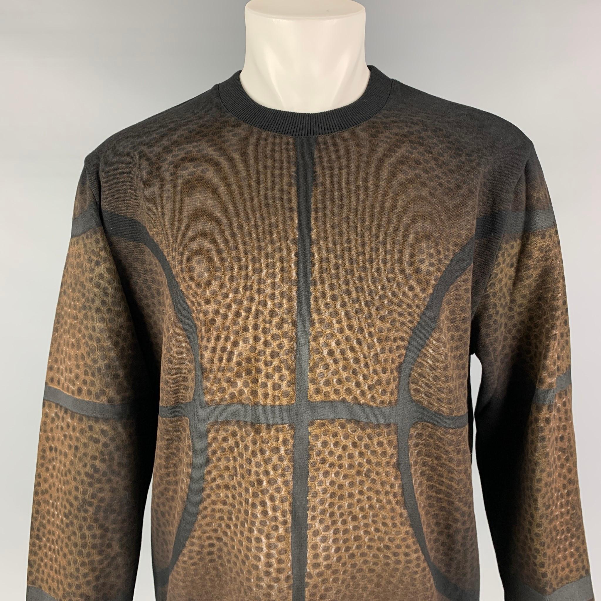 GIVENCHY Fall 2014 Basketball Collection by Ricardo Tisci pullover comes in a black & brown cotton featuring a basketball graphic design, loose fit, and a crew-neck. 

New With Tags. 
Marked: S

Measurements:

Shoulder: 20 in.
Chest: 48 in.
Sleeve: