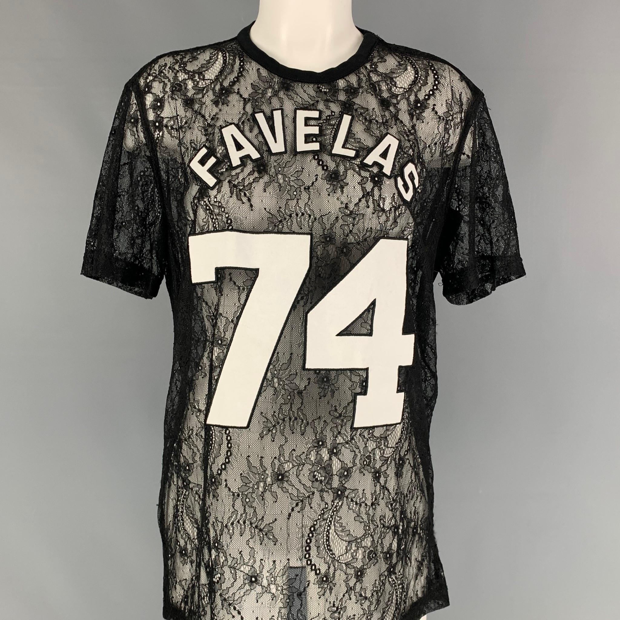 GIVENCHY Fall 2014 t-shirt comes in a black & white lace viscose / polyamide featuring a front 'Favelas 74' logo design, crew-neck, and a shoulder zipper closure. Made in Portugal. 

Excellent Pre-Owned Condition.
Marked: S

Measurements:

Shoulder: