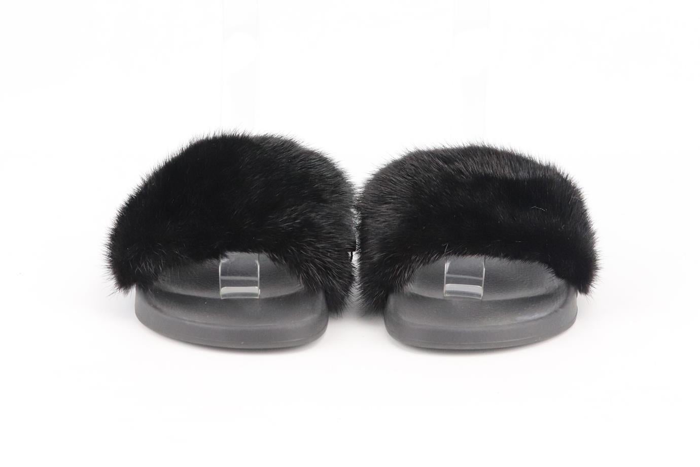 Givenchy fur and rubber slides. Made from black mink fur and rubber with comfortable molded footbeds. Black. Slips on. Does not come with box or dustbag. Size: EU 38 (UK 5, US 8). Insole: 9.6 in. Platform: 1 in
