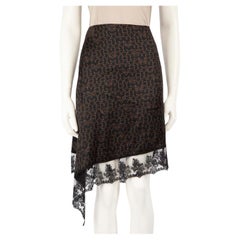 Givenchy Givenchy Schwarzer Seidenstern Spitzenbesatz Minirock Größe M