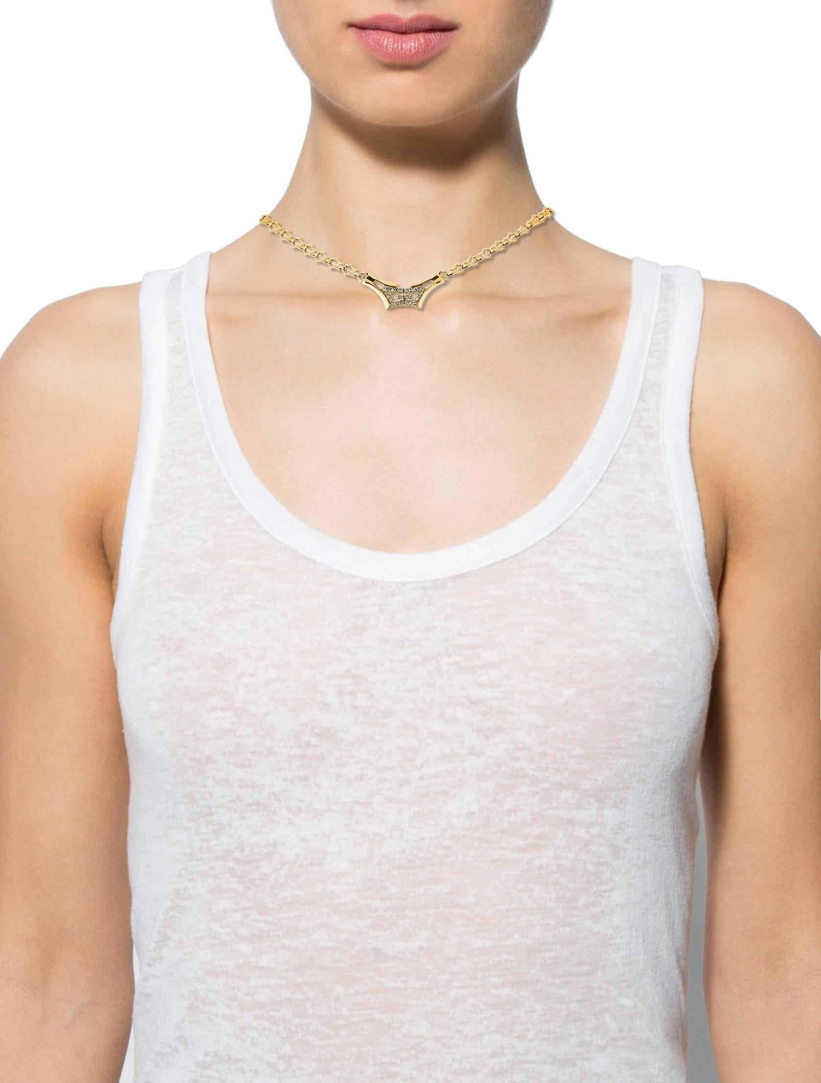Givenchy Gold Chain GG Charm Pendant Crystal Choker Chain Evening Necklace 

Style Tip: The perfect necklace for layering!

Metal
Crystal
Gold tone
Hinge closure
Signed Givenchy
Total length 14