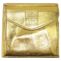 Givenchy - Portefeuille de soirée en cuir doré avec logo, années 1960