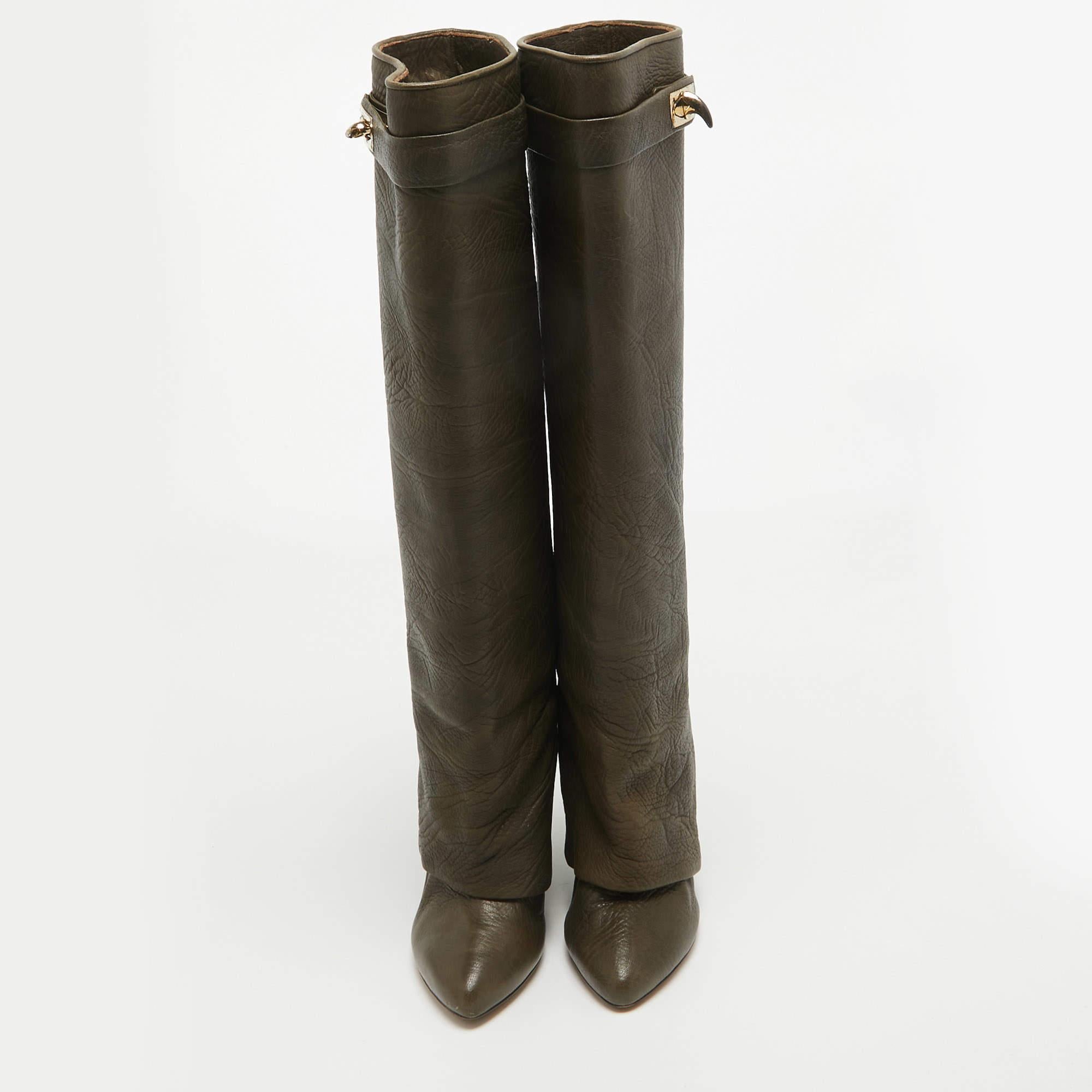 Givenchy's shark lock boots are back on trend so this pair will be a fine addition this season. Crafted from nubuck leather, the boots have a classy green hue and are set on wedge heels.

Includes
Original Dustbag