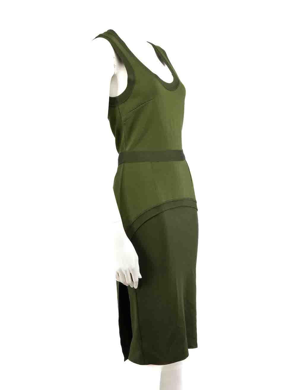 CONDITION is Very good. Minimal wear to dress is evident. Minimal wear to zipper pull where paint is slightly chipped on this used Givenchy designer resale item.
 
 
 
 Details
 
 
 Green
 
 Viscose
 
 Dress
 
 Layered bodycon detail
 
 Midi
 
