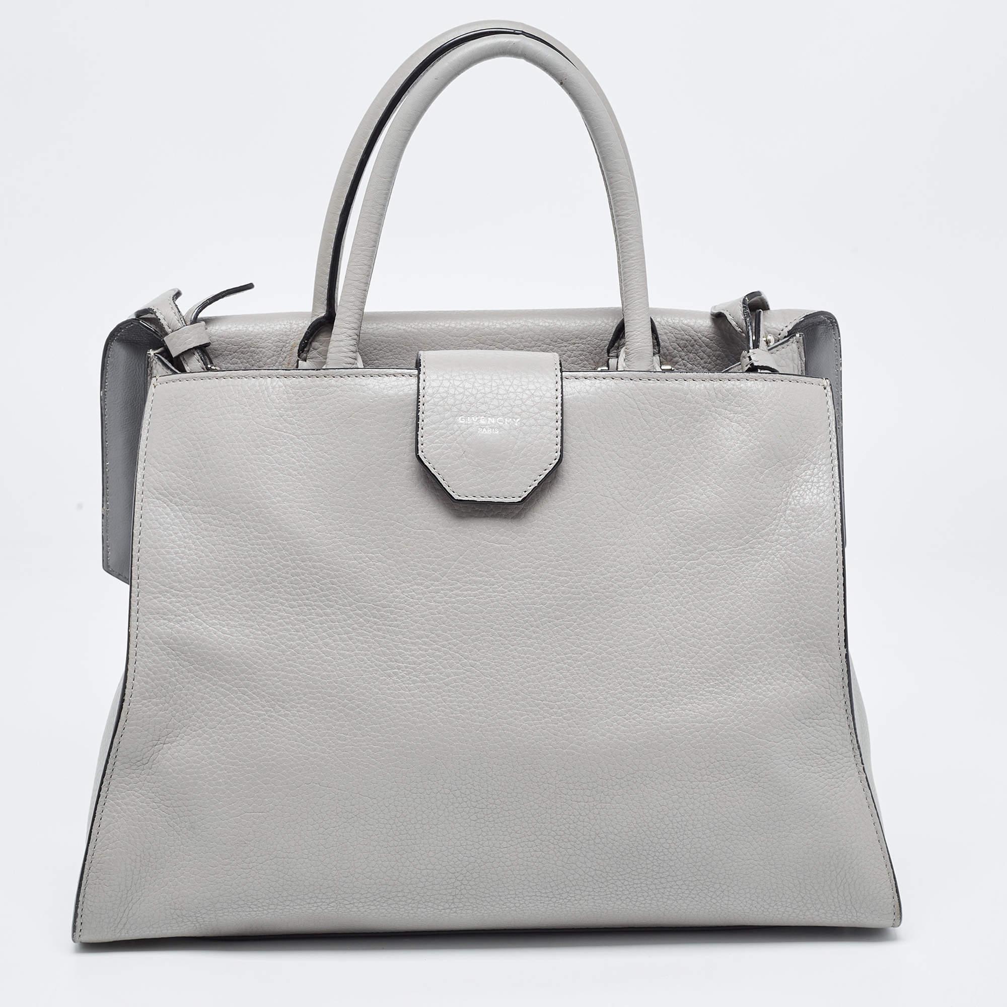 This alluring tote bag for women has been designed to assist you on any day. Convenient to carry and fashionably designed, the tote is cut with skill and sewn into a great shape. It is well-equipped to be a reliable accessory.

Includes: Info Booklet