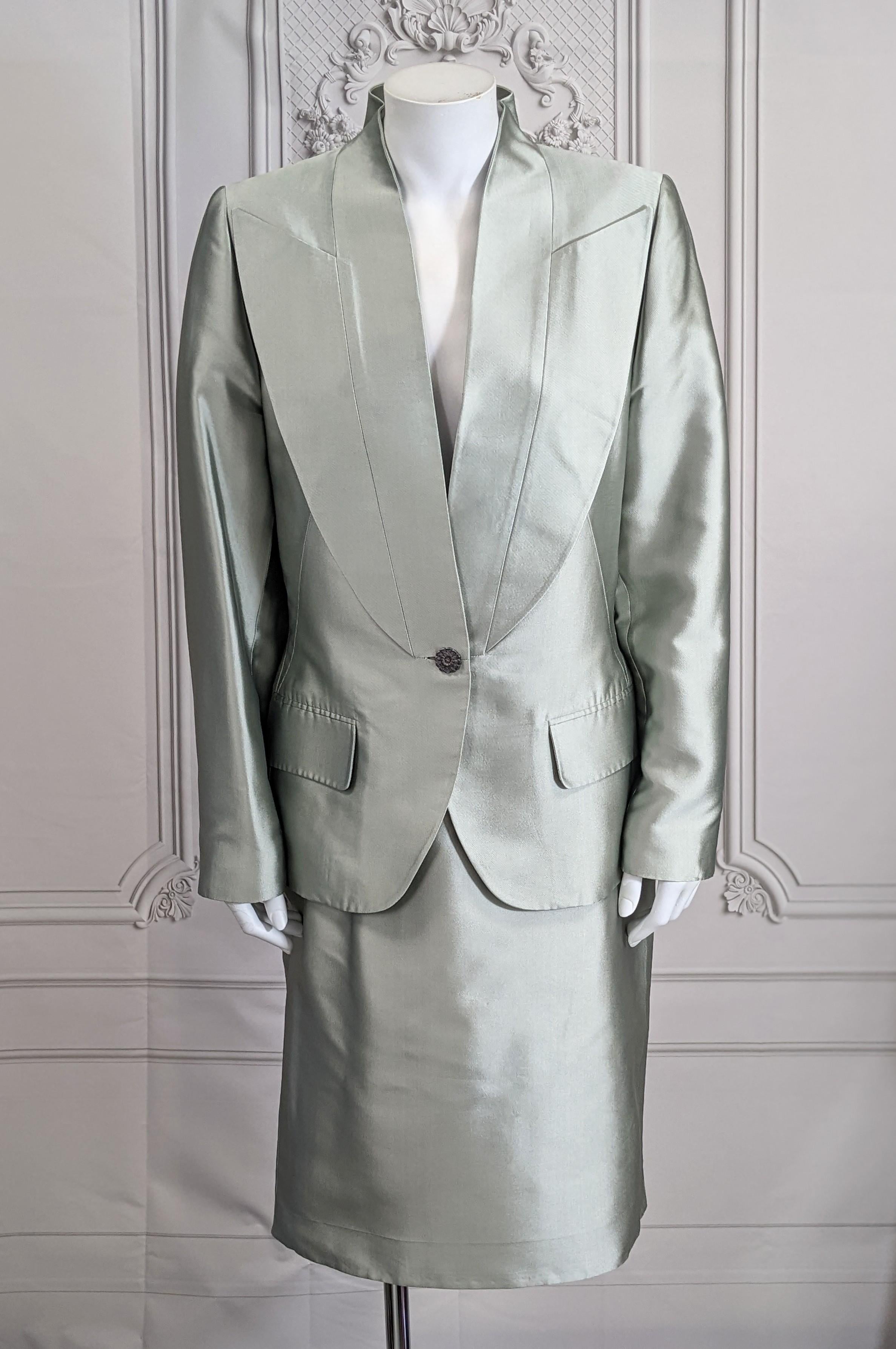 Givenchy Haute Couture Celadon Silk Twill Suit, Alexander McQueen. Razor sharp detailing with extreme pointy lapels inserted into front panels with a high stand away collar. Slim cut skirt. Silver plated faux cut steel Victorian buttons on front and