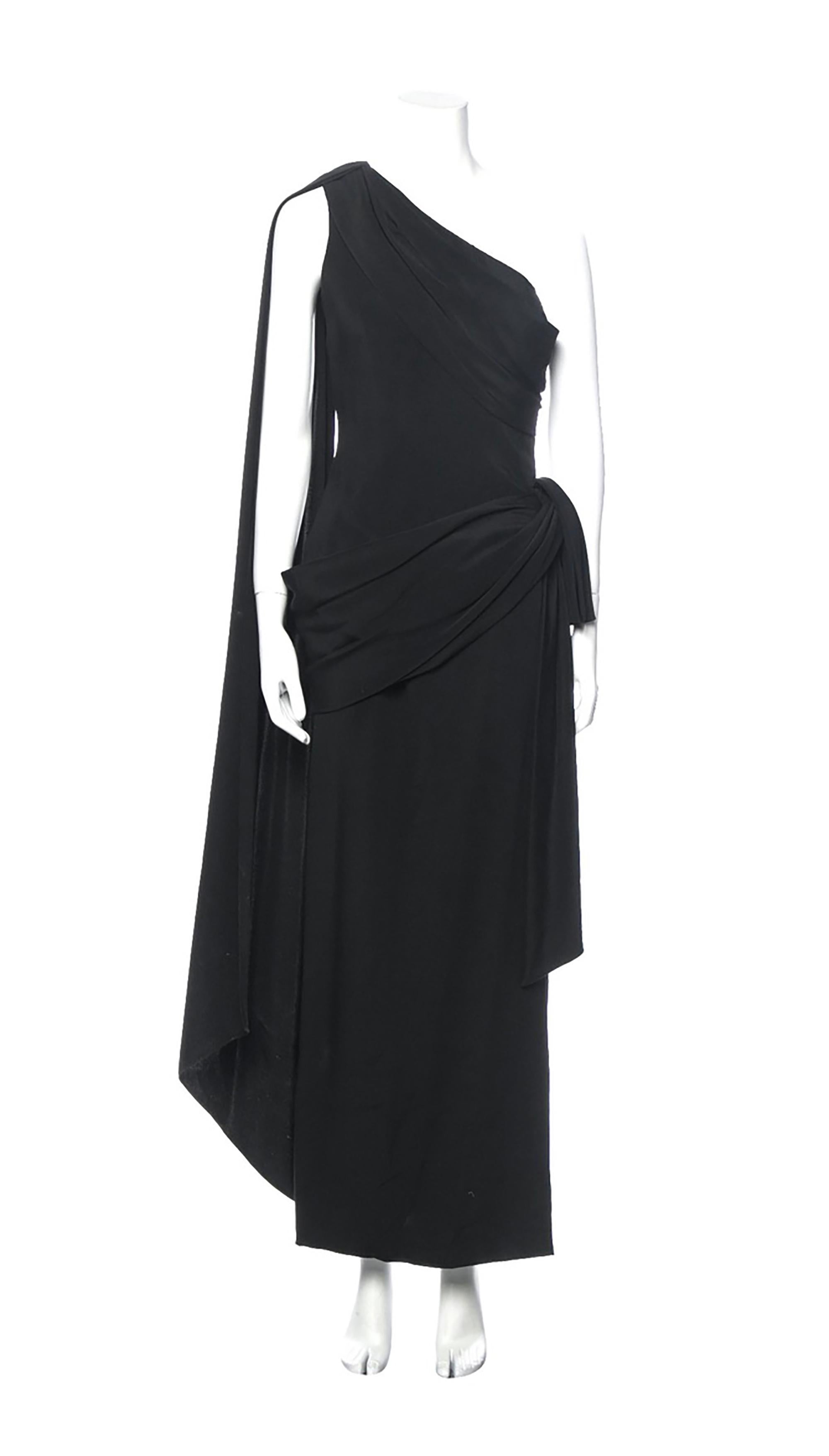 Late 80s- early 90s Givenchy Haute Couture one shoulder evening gown. 
Black
Side zipper
Silk blend fabric
Condition: Excellent
30