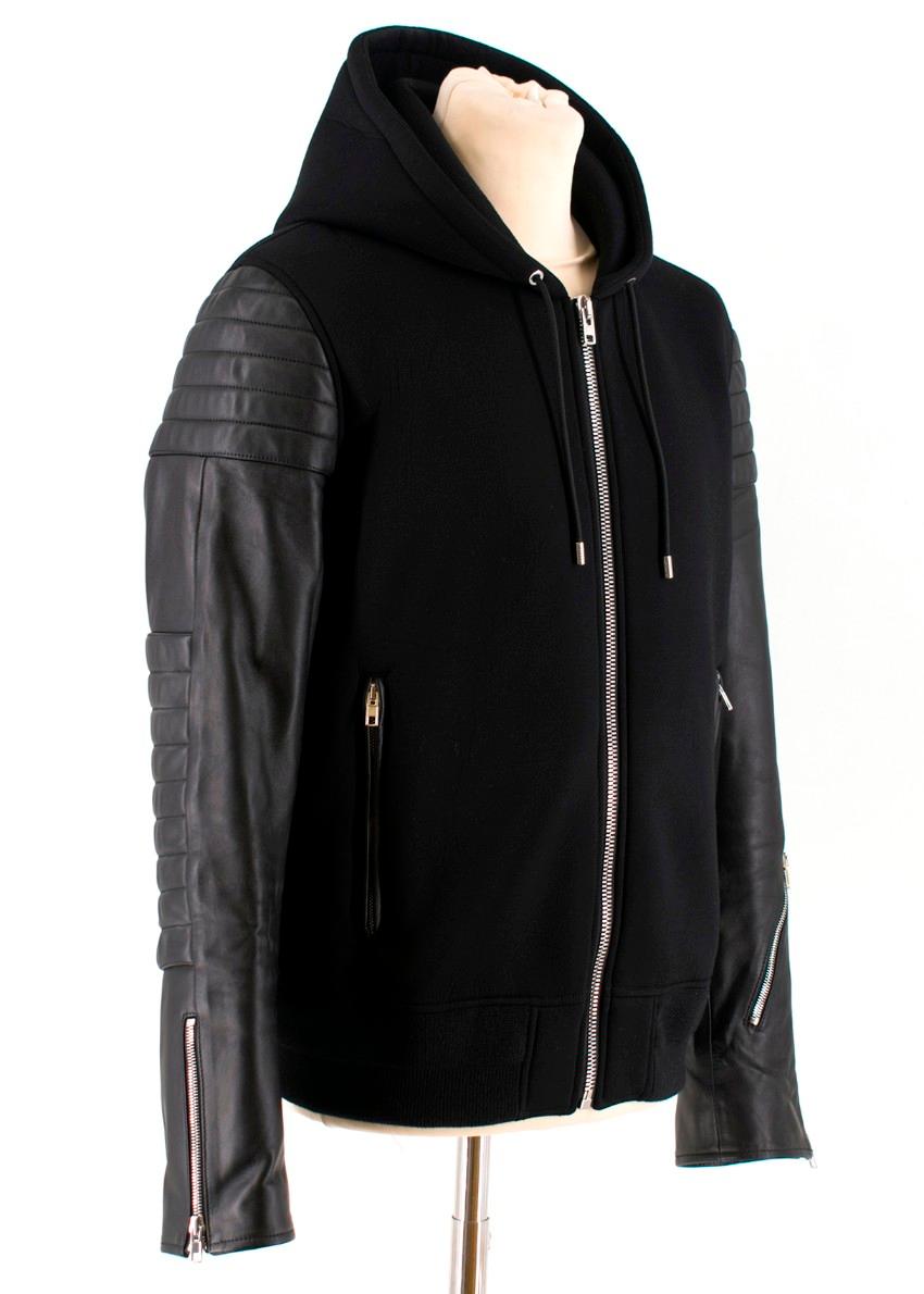 Givenchy leather-sleeved neoprene bomber jacket

- Black, neoprene 
- Attached drawstring hood, long quilted leather sleeves, zip-fastening cuffs 
- Zip-fastening pockets
- Black ribbed-knit hem 
-Centre-front zip fastening
- Internal jet pockets,