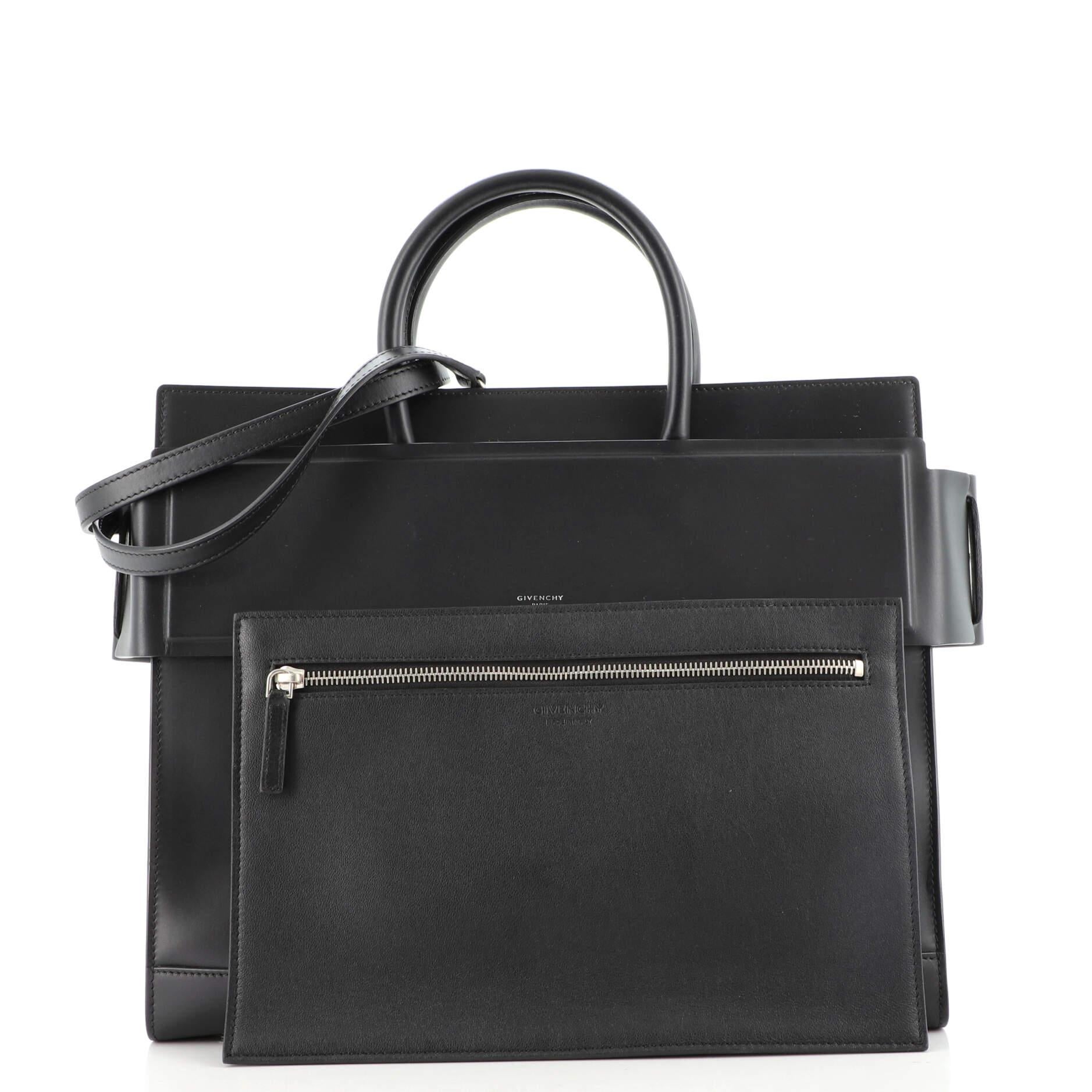 Condition: Very good. Minor wear and scuffs on exterior, handles and strap, creasing on strap. Scuffs in interior, scratches and tarnish on hardware.
Accessories: Pochette, With Strap
Measurements: Handle Drop 4