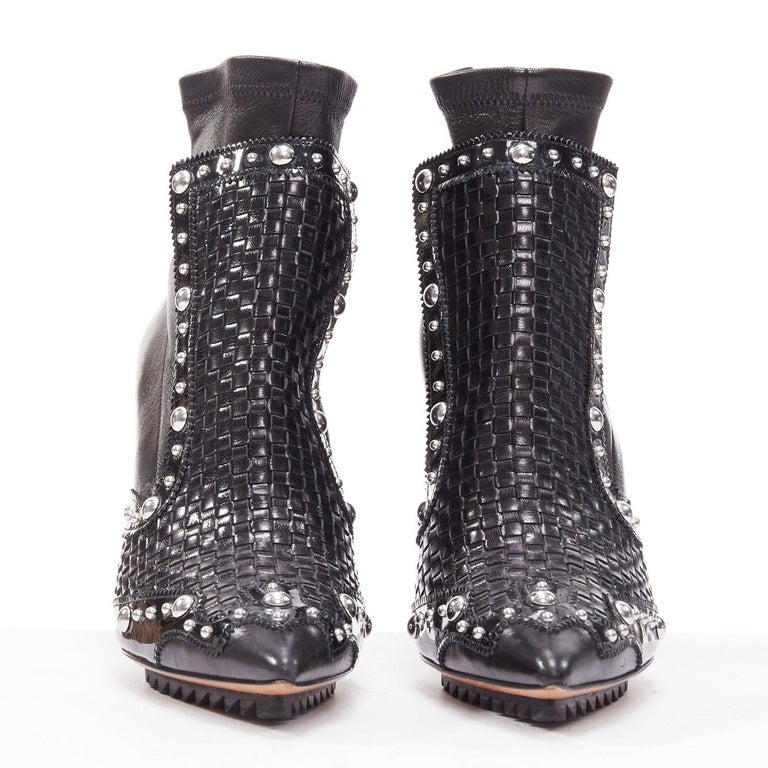 GIVENCHY Iron Line in pelle intrecciata a canestro con borchie d