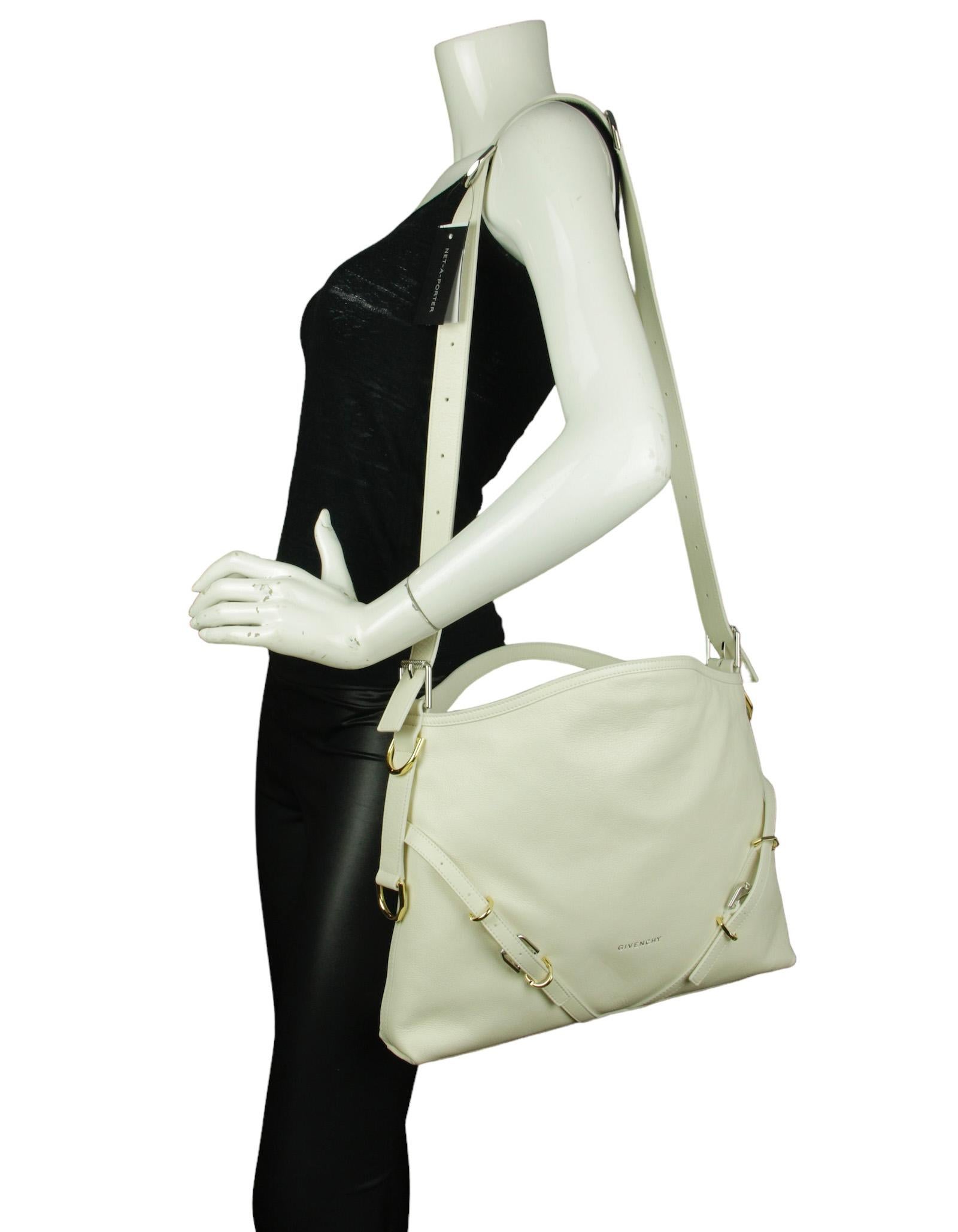 Givenchy Ivory Medium Calfskin Leather Voyou Shoulder Bag


Made In: Italy
Year of Production: 2023
Color: Ivory
Hardware: Silvertone and goldtone
Materials: Calfskin
Lining: Beige textile
Closure/Opening: Open top
Exterior Pockets: None
Interior