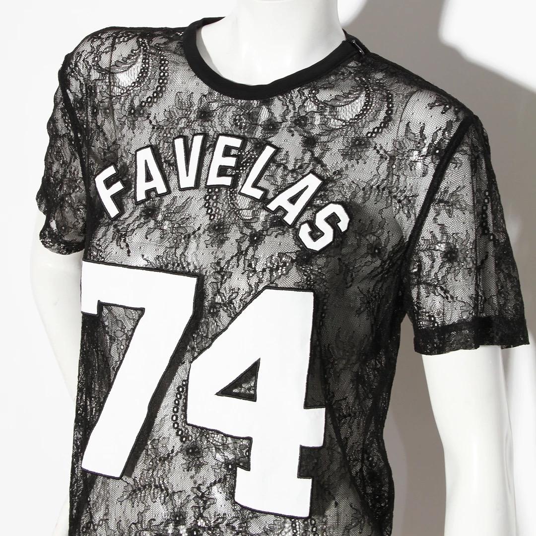 Givenchy Designer T-Shirt by Ricardo Tisci 
Made in Portugal 
Black
Floral lace
Crew neckline
Short-sleeve
Sheer
Pullover style with concealed zipper on left shoulder
Favelas 74 Embroidery
54% Viscose, 46% Polyamide
Excellent condition; Preloved