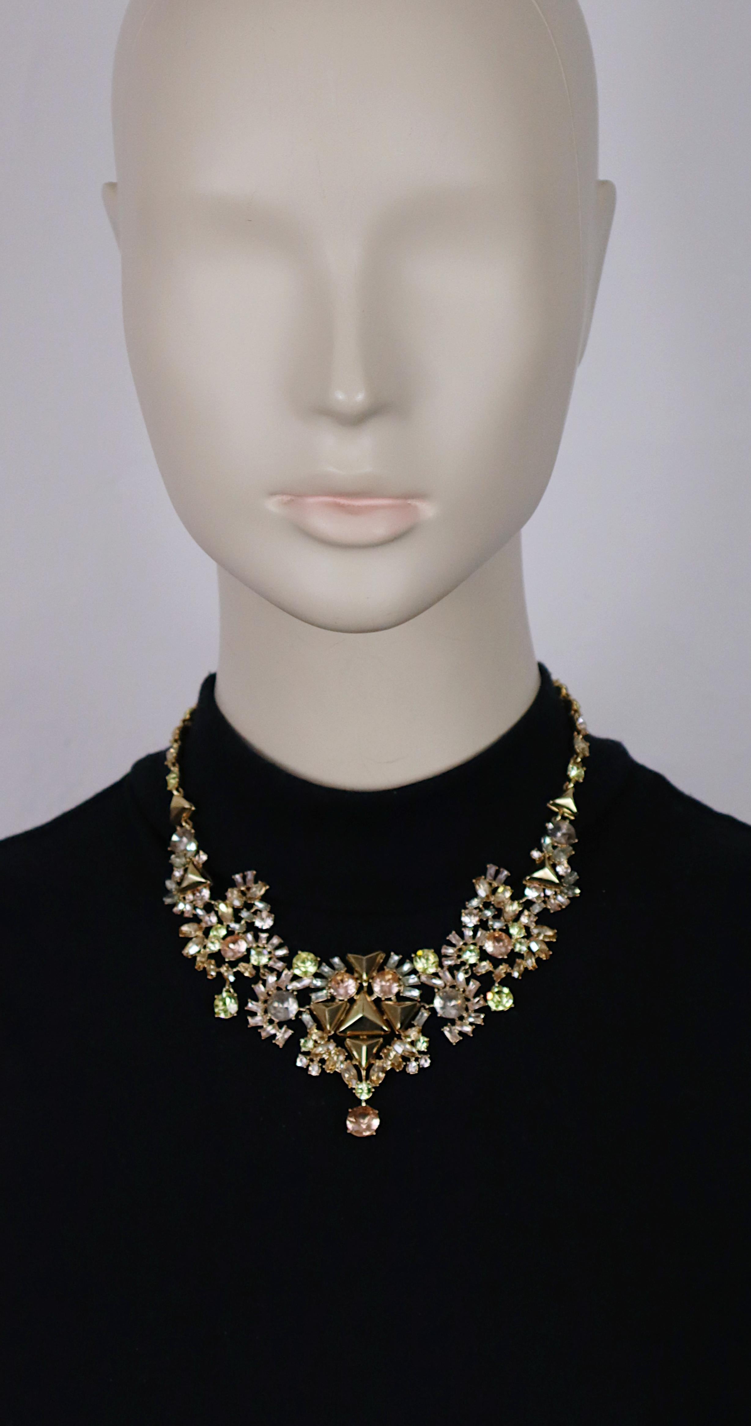 GIVENCHY gold tone necklace embellished with multicolor crystals.

Fold over clasp closure.

Embossed GIVENCHY on the clasp.

Indicative measurements : adjustable length from approx. 42 cm (16.54 inches) to approx. 47 cm (18.50 inches) / max. width