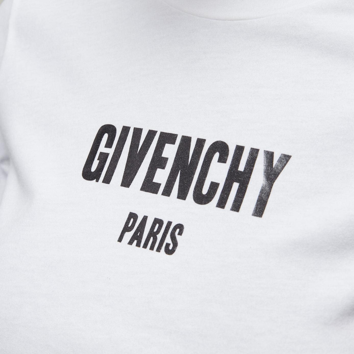 GIVENCHY KIDS logo print 3/4 sleeves cropped tshirt 12Y
Reference: AAWC/A00752
Brand: Givenchy
Collection: Kids
Material: Cotton
Color: White, Black
Pattern: Solid
Closure: Pullover
Lining: Unlined
Made in: Tunisia

CONDITION:
Condition: Excellent,