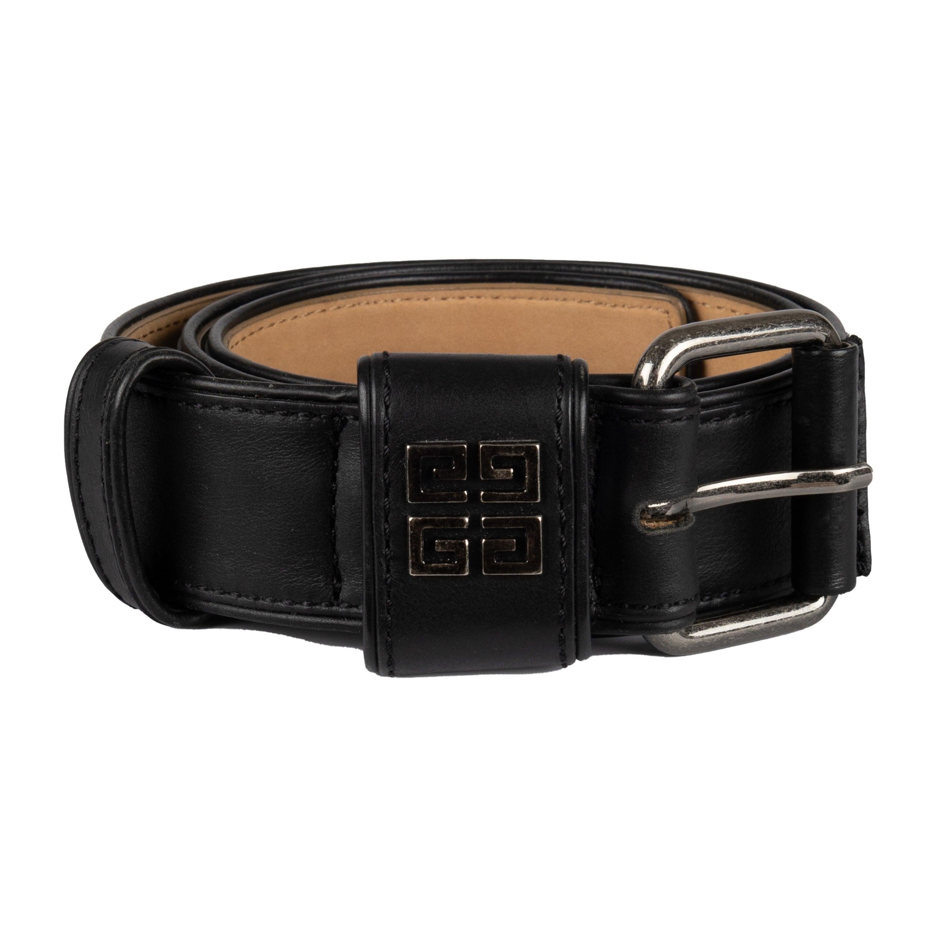 This Givenchy Leather Belt is crafted from genuine calfskin leather in classic black. A silver toned 4G buckle closure ensures a secure fit, accented with the iconic Givenchy signature. Adjustable buckle ensures a tailored fit.
 
 Width:4;Total