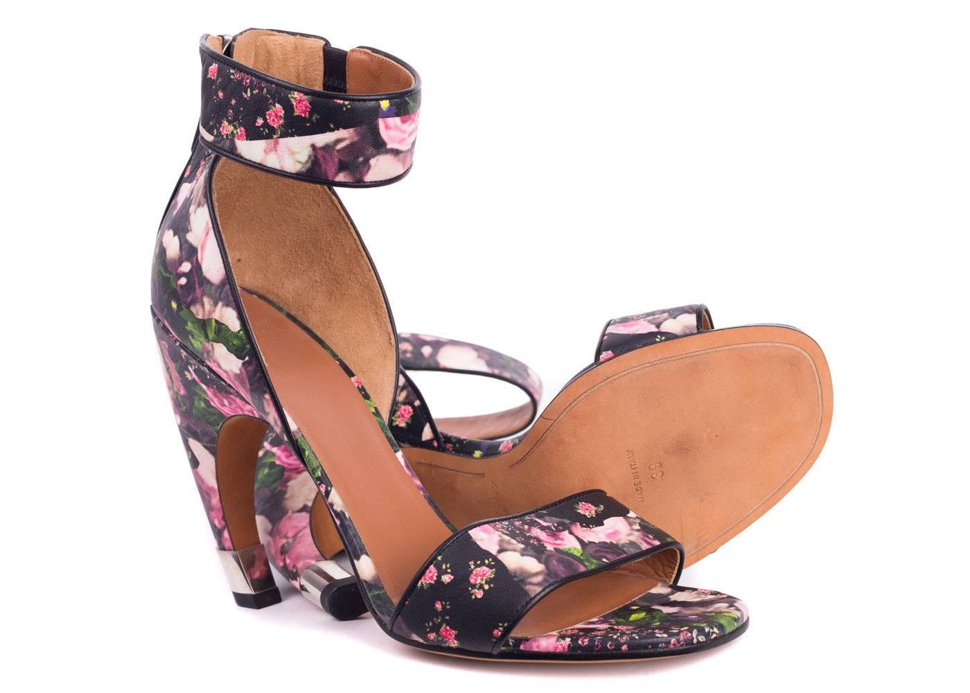 Strut in style with cool-chic elegance courtesy of Givenchy. This unique curved heel sandal features Givenchy's classic floral print in a supple nappa leather. In the coveted d'Orsay silhouette this sandal will be sure to accentuate your legs and