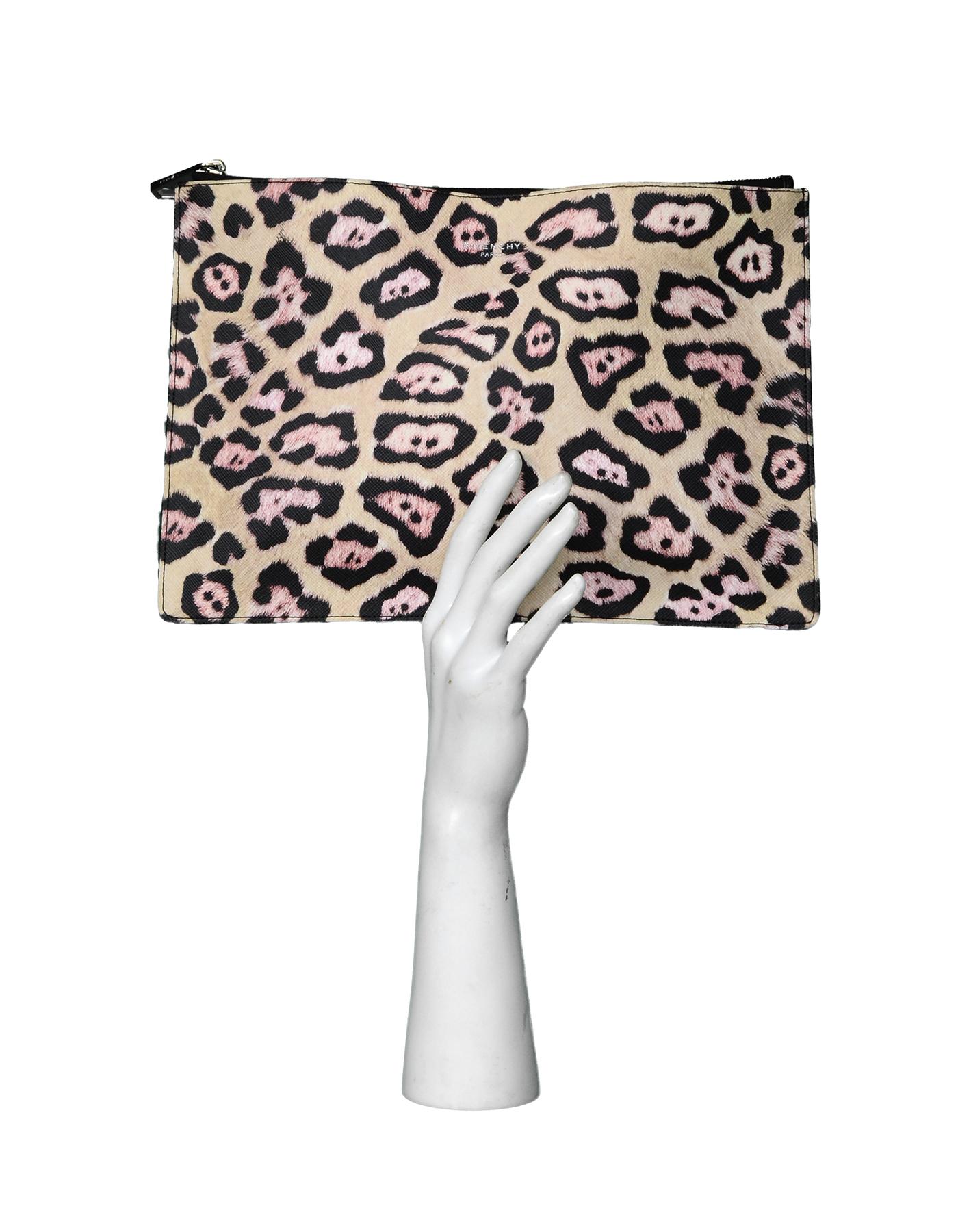 Givenchy Leopard Print Grained Leather Zip Top Clutch Bag

Made In: Romania
Year of Production: 2015
Color: Tan, brown, pink
Hardware: Silvertone
Materials: Grained leather, metal
Lining: Black textile 
Closure/Opening: Zip top
Exterior Pockets: