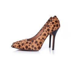 Givenchy, Leopard print ponyhair pumps.