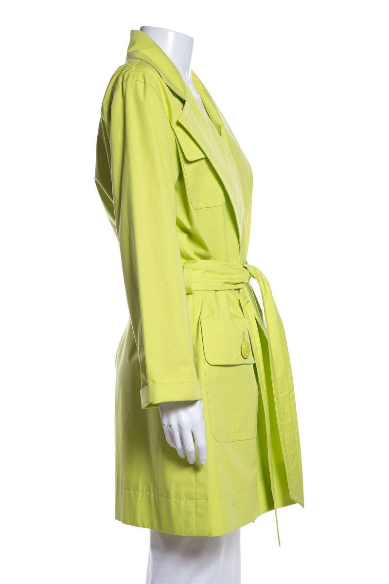 Givenchy lime green long sleeve trench coat with notched lapel, four front patch pockets, and belted waist.