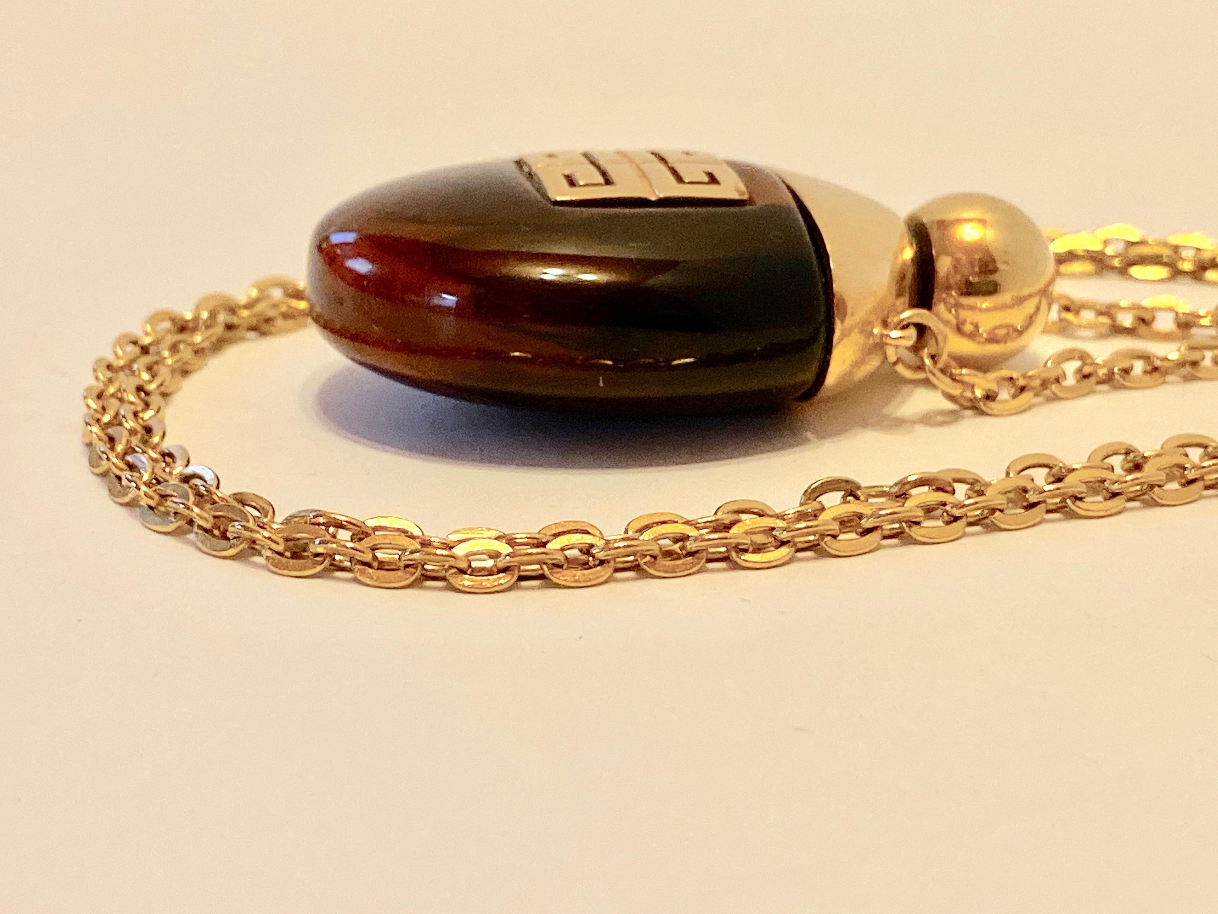 Givenchy, collier pendentif parfum en lucite « Tortoise Shell » « édition limitée » Unisexe en vente