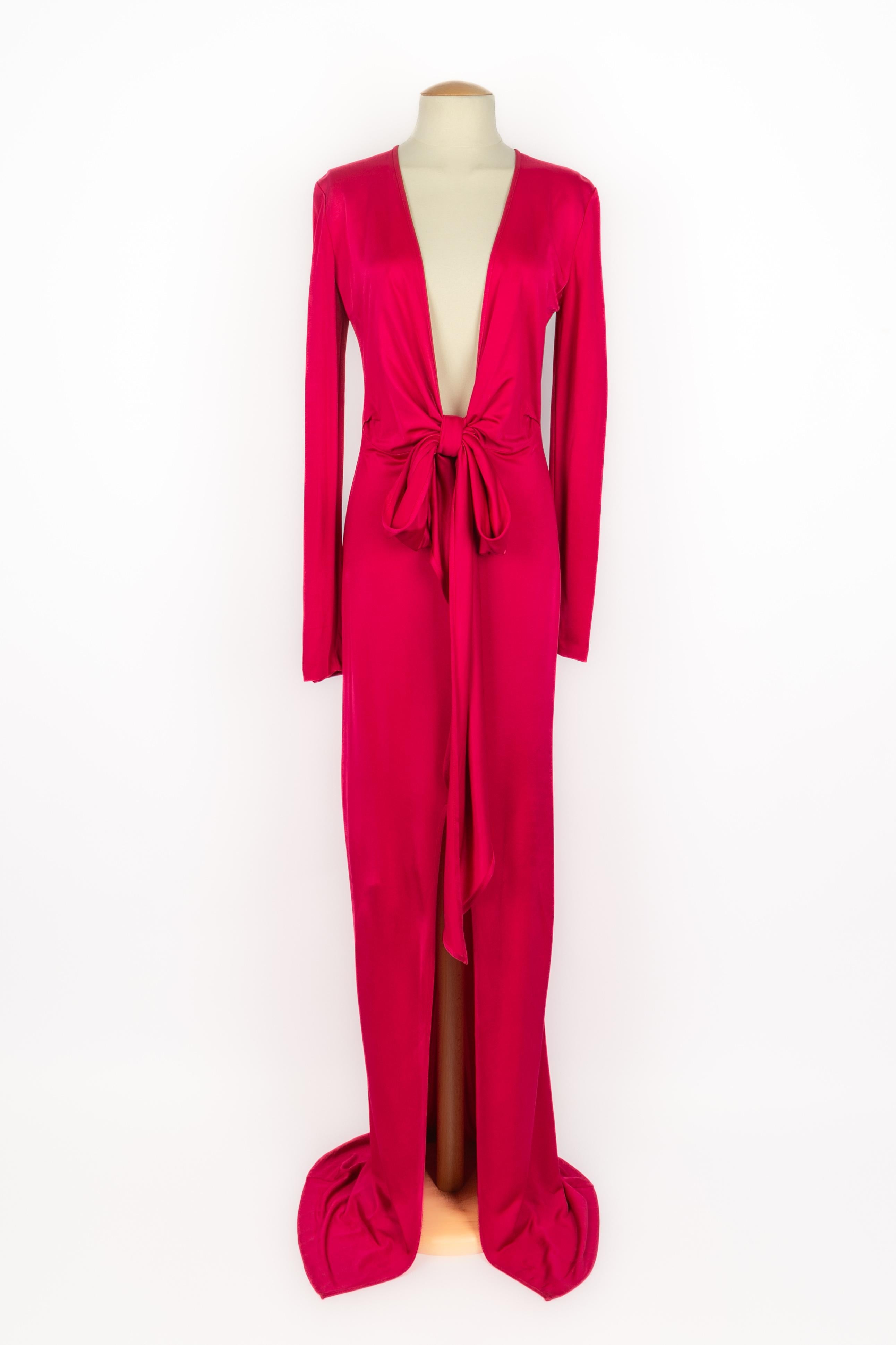 GIVENCHY - (Made in Italy) Vestido largo elástico con abertura delantera. Talla 38FR indicada.

Estado:
Muy buen estado

Dimensiones:
Anchura de los hombros: 45 cm - Pecho: 47 cm - Cintura: 36 cm - Caderas: 46 cm - Longitud de las mangas: 71 cm -