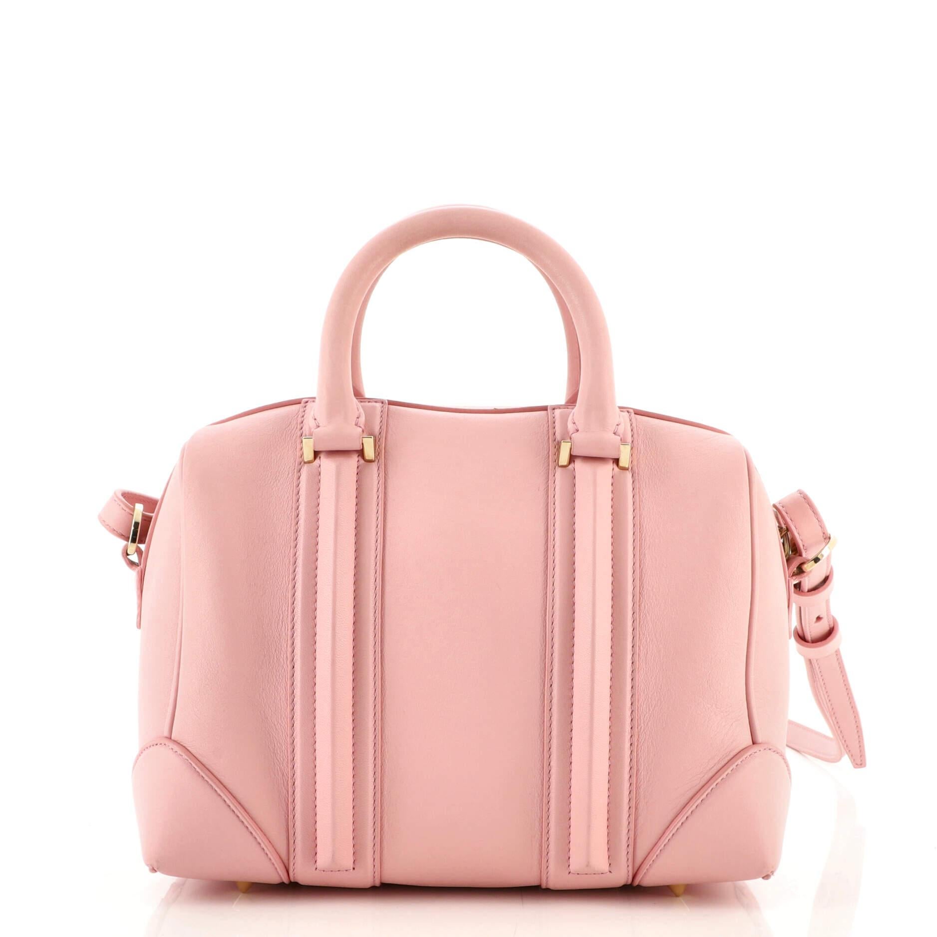 pink leather duffle bag