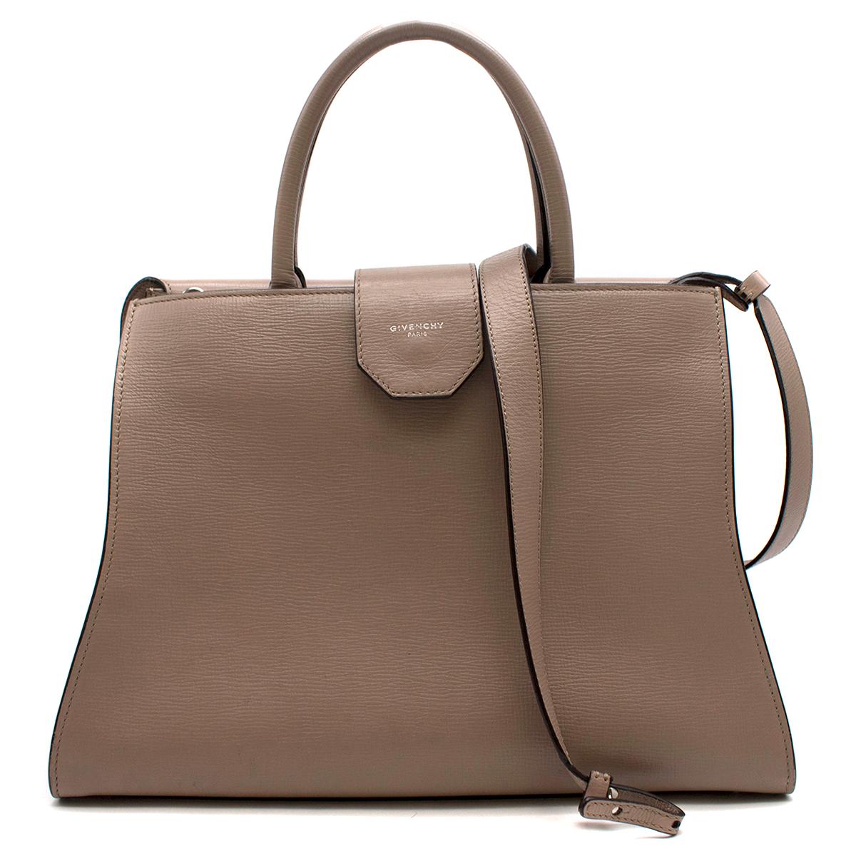 Givenchy Medium Taupe Obsedia Satchel

- Top handle bag in taupe leather 
- Non-removable leather shoulder strap
- The bag can be worn as a top hand bag or on the shoulders
- Two top rounded handles
- Silver-tone hardware
- Soft leather interior