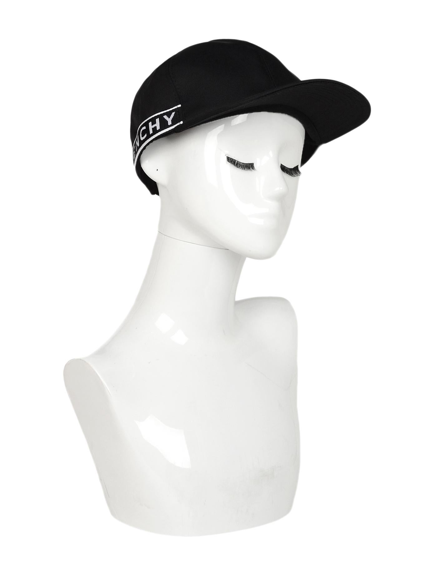 Givenchy Men's Black 4G Side Strap Baseball Cap

Made In: Italy
Color: Black/white
Hardware: Silvertone
Materials: 66% PA (polyacrylic), 26% CO (cotton), 8% PU (polyurethane)
Lining: 100% cotton
Closure/Opening: Velcro strap back
Overall Condition: