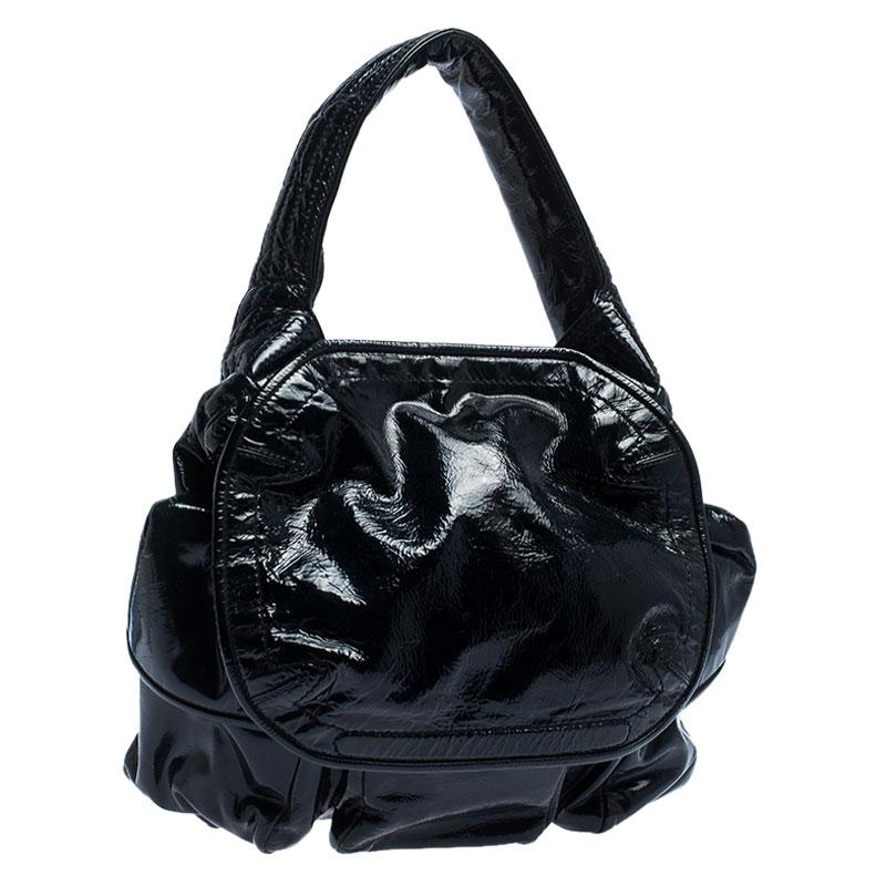A perfect complement to your attire will be this trendy hobo from Givenchy. Crafted from patent leather, this hobo is lined with the best fabric, this bag gives both style and endurance. It features side pockets and dual handles.

