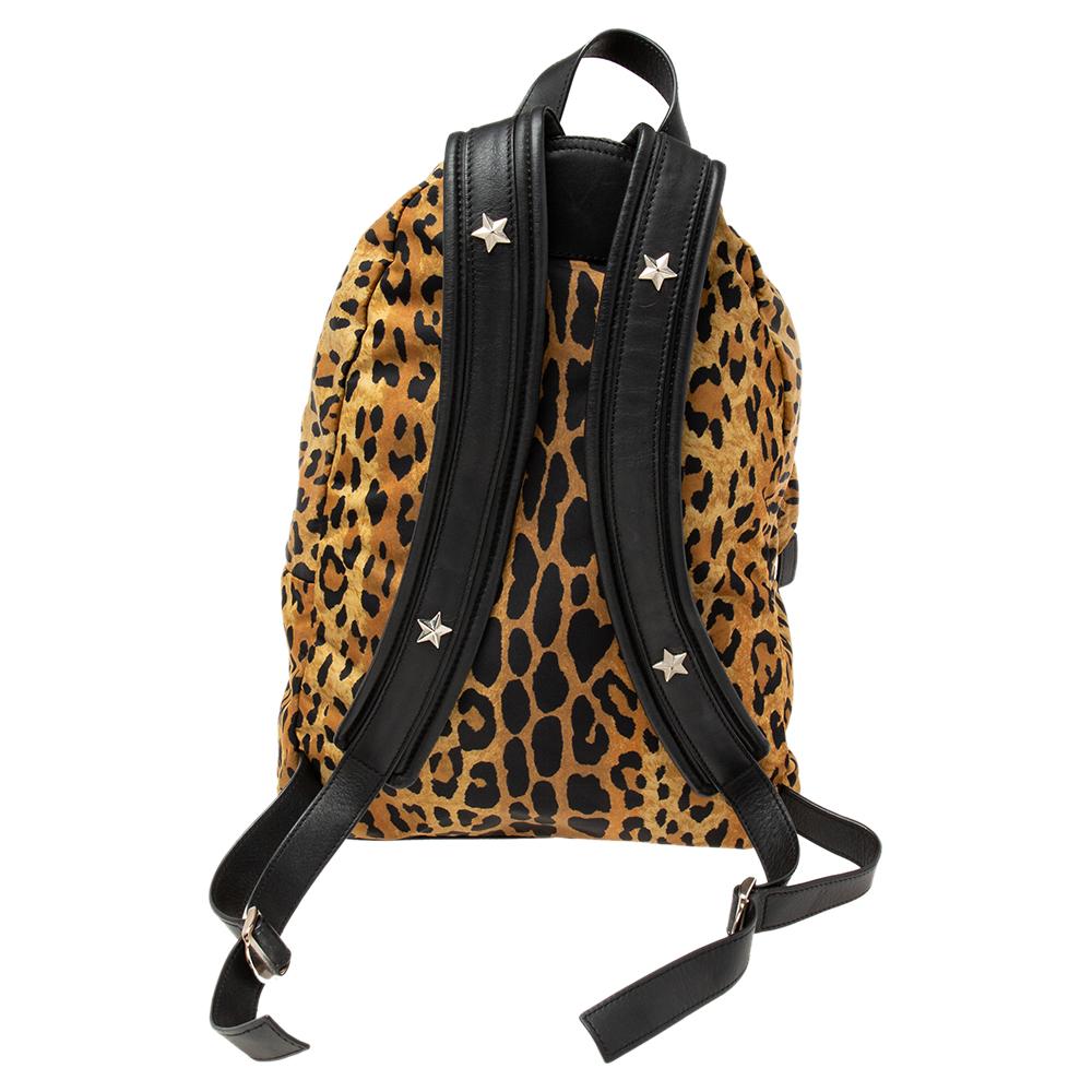 Givenchy's leopard-printed backpack in nylon and leather is an accessory you can bank on. It is stylish, light, and highly spacious. The backpack has a top handle and two shoulder straps that can be adjusted.

