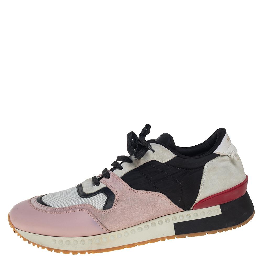 This pair of Givenchy sneakers will make a mark for themselves in your closet. Crafted from leather, suede, fabric, and mesh, they are adorned in subtle hues. They come equipped with laces, fabric lining, leather insoles, and rubber soles. The