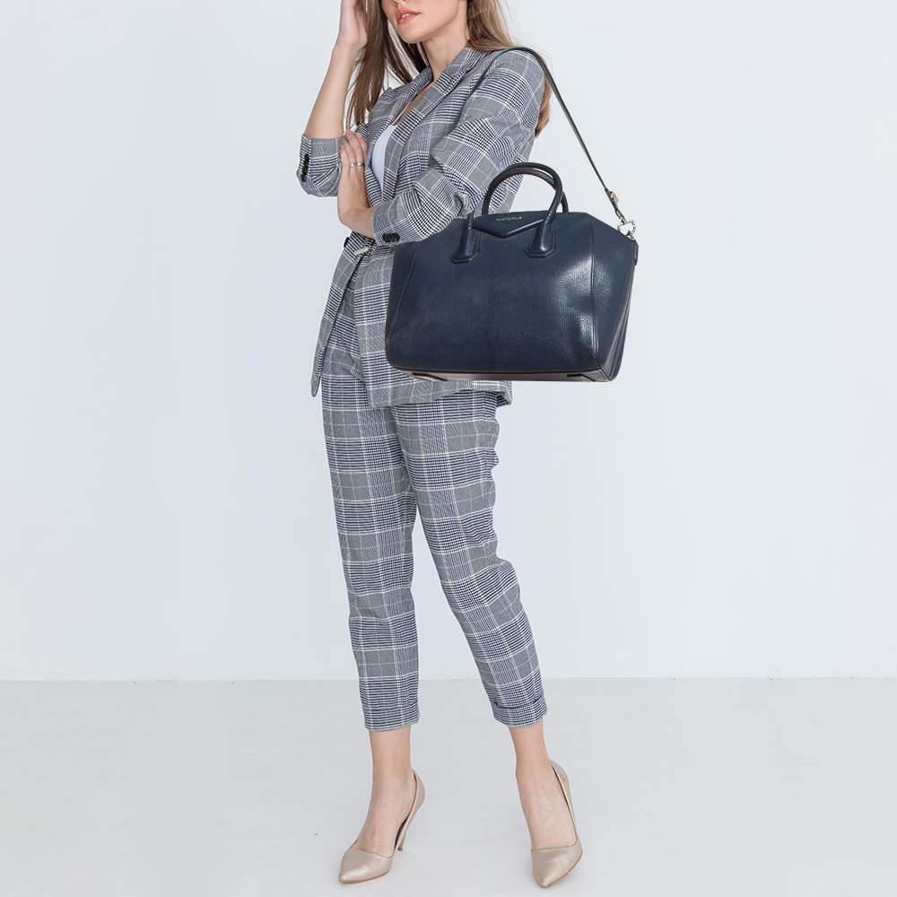 If you are looking for something that reflects chic and luxury  then this satchel is a perfect choice. Crafted from premium materials  it can be conveniently carried around and its interior is spaciously sized to house your belongings with ease.