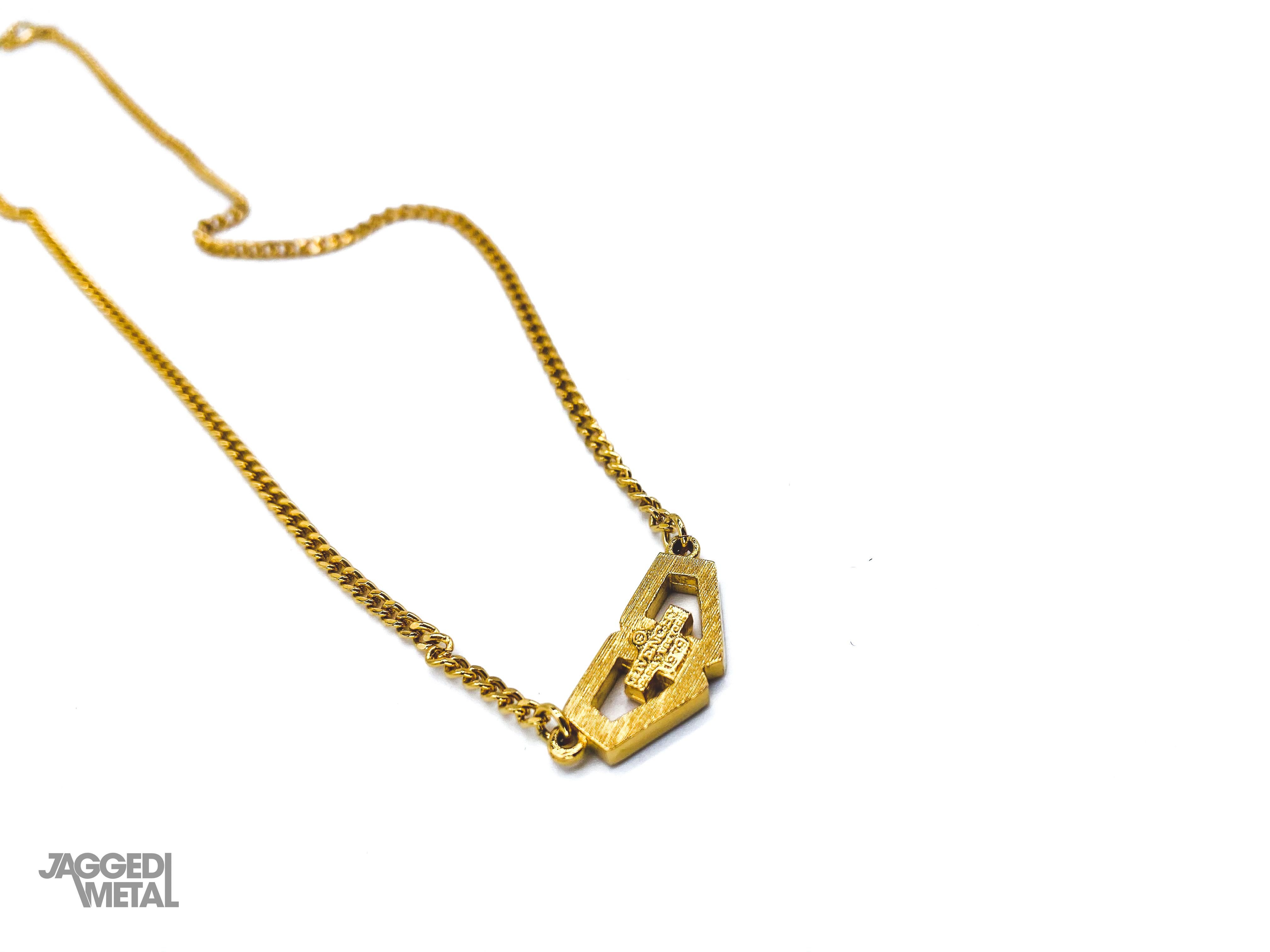 Collier pendentif vintage GIVENCHY plaqué or, années 1970 Pour femmes en vente