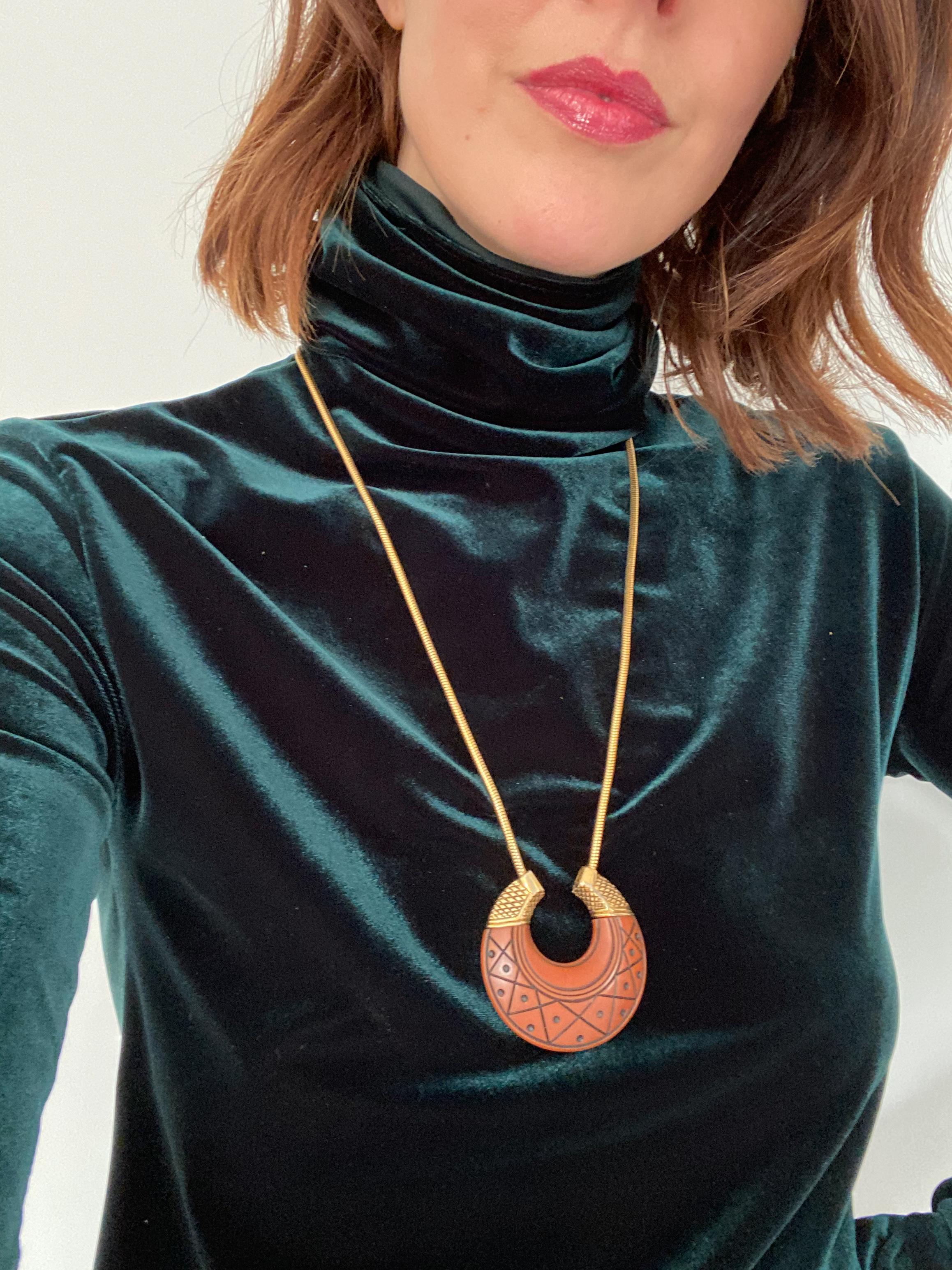 Givenchy 1970s Vintage Pendant Necklace. 

A rare ethnic inspired statement piece from the 1977 collection. A time when Givenchy quality and design was at it's best

Detail
-Made in France in 1977
-Chain crafted form high quality gold plated