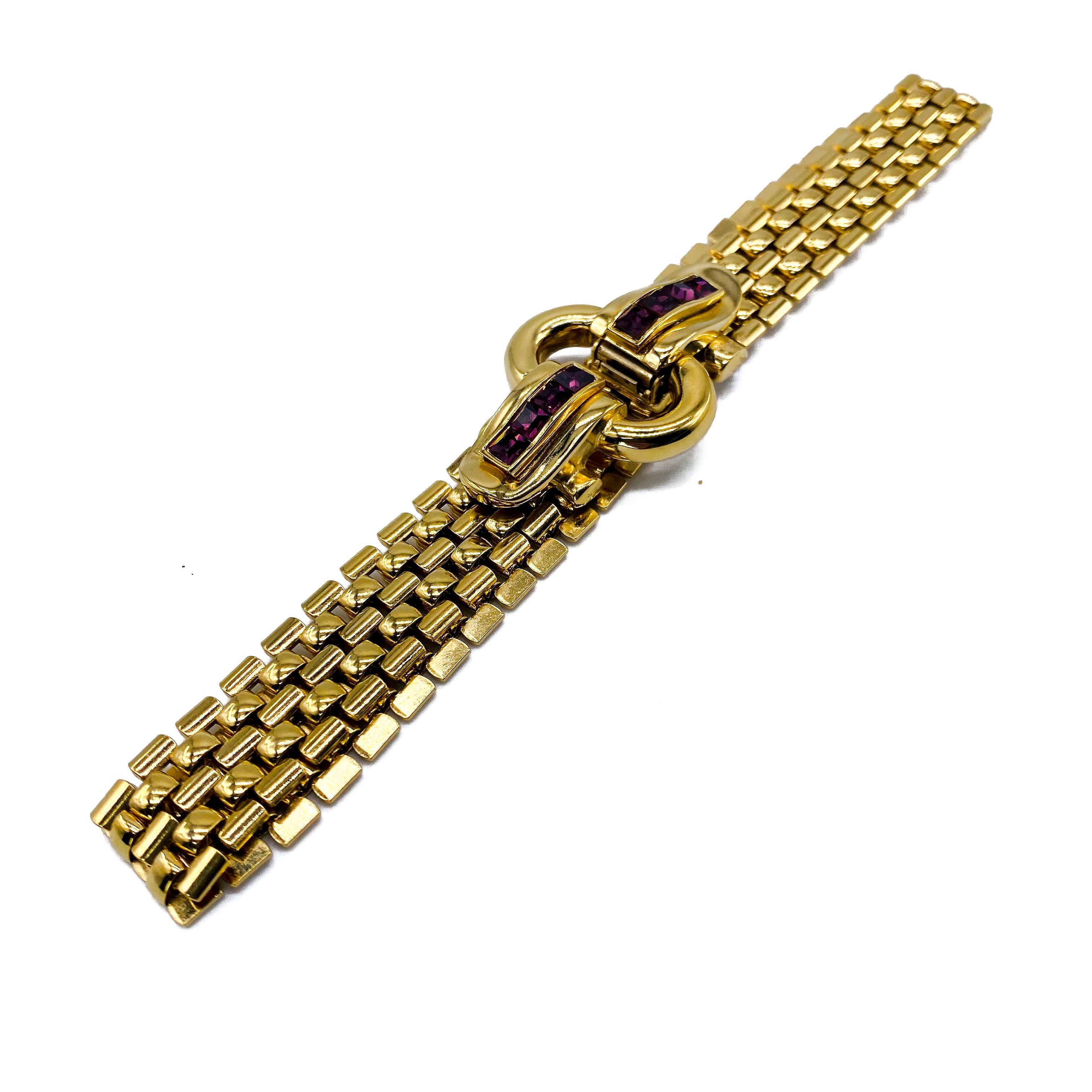 Givenchy Vintage 1980s Choker Necklace

Detail
-Made in France in the early 1980s
-Crafted from high quality gold plated metal and set with amethyst crystals
-Wide articulated choker chain

Size & Fit
-Length - approx 13 inches
-Width - approx 5/8