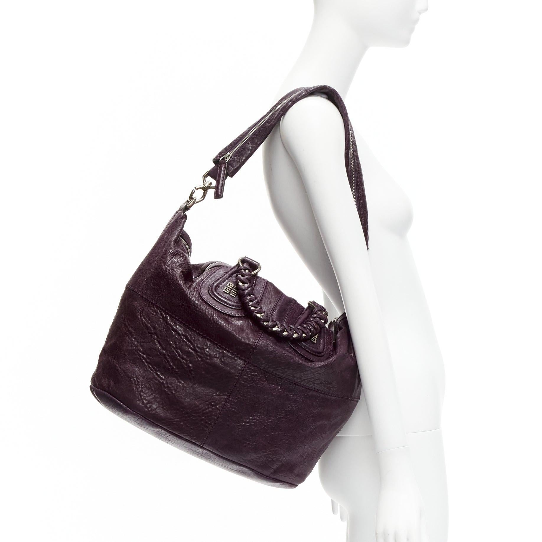 GIVENCHY Nightingale dark purple leather SHW top handle satchel bag
Reference: CELE/A00020
Brand: Givenchy
Model: Nightingale
Material: Leather
Color: Purple
Pattern: Solid
Closure: Zip
Lining: Black Fabric
Extra Details: Givenchy Top Handle Bag.