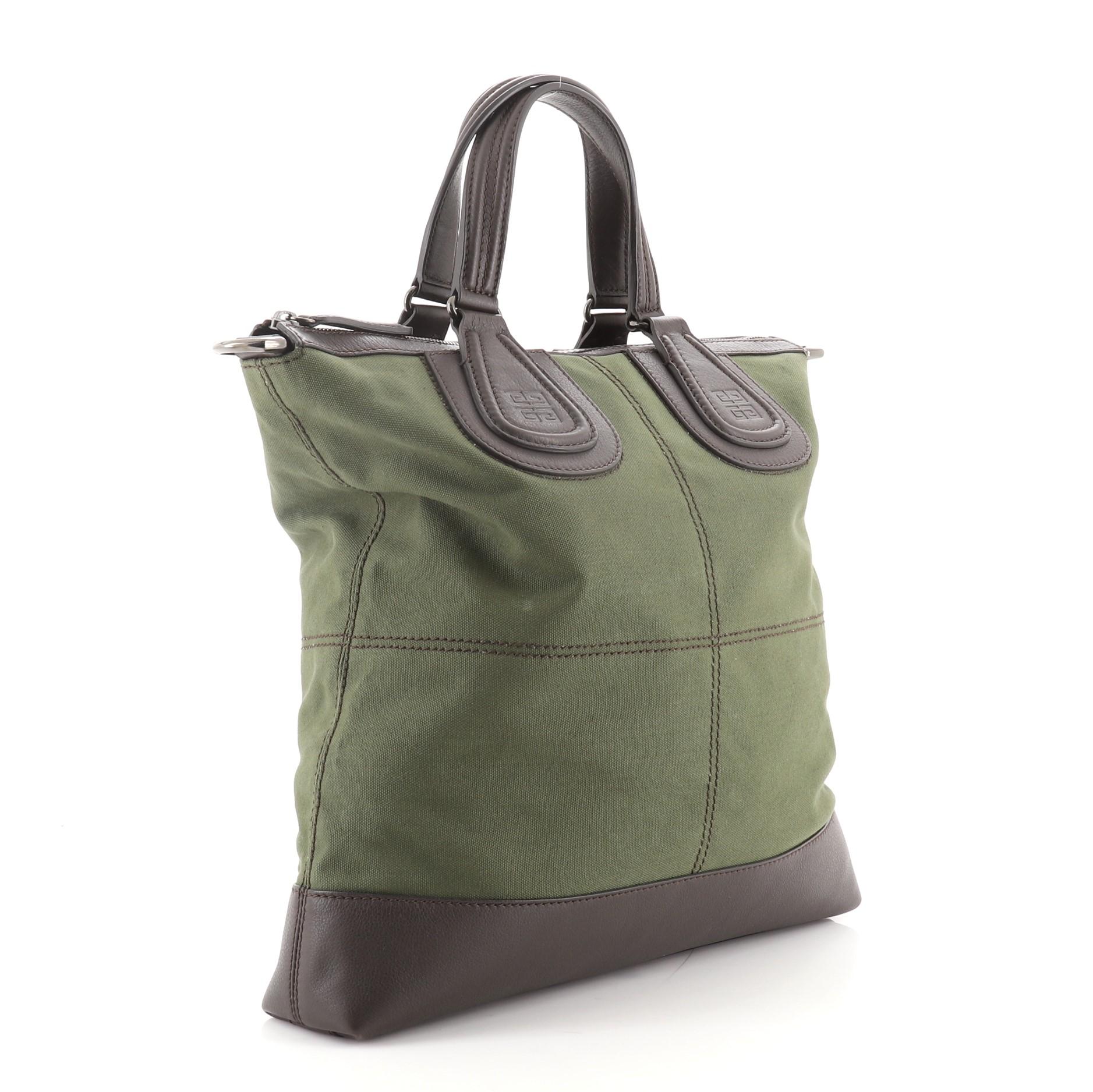 Givenchy Nightingale Flat Shopper Tote Canvas with Leather
Brown, Green

Condition Details: Minor scuffs and wear on leather trims and handles, light marks on exterior, wear on base corners, scratches on hardware.

52949MSC

Height 15