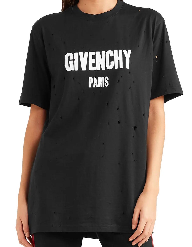 Givenchy NWT Black/White Distressed T-Shirt sz Medium

Made In: Portugal
Color: Black with white graphic
Materials: 100% cotton
Opening/Closure: Pull over
Overall Condition: New with tags.  Intentionally distressed.
Estimated Retail: $775 plus