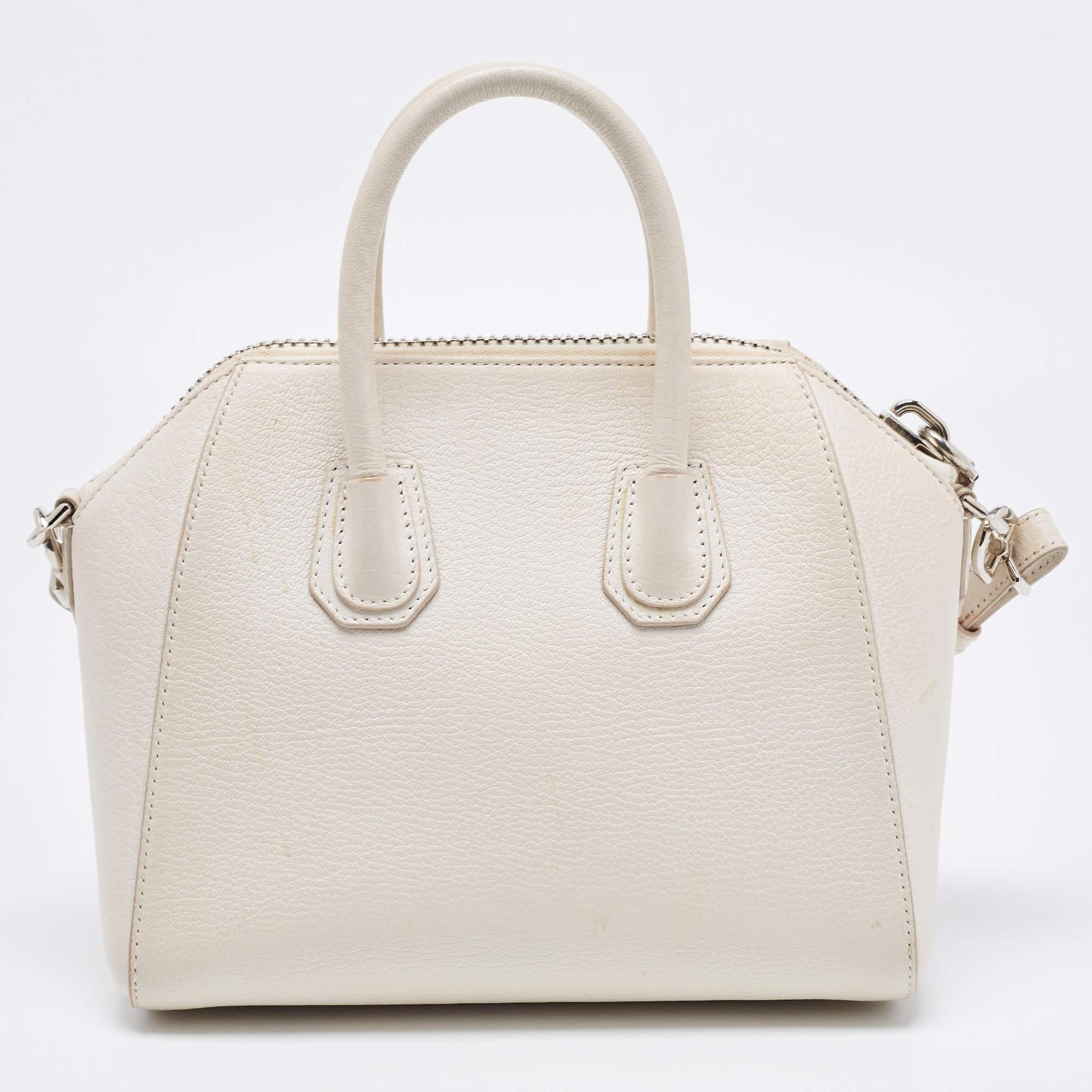 This authentic Givenchy satchel is rendered in the finest quality materials into an elegant design. Versatile and functional, this carryall is well-sized for your daily use.

Includes: Detachable Strap