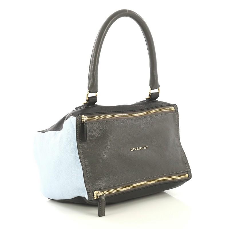 This Givenchy Pandora Bag Leather Small, crafted from black, blue and gray leather, features a rolled top handle, exterior zip pocket, and gold-tone hardware. Its two-way zip fastenings open to a black fabric interior with side zip and slip pockets.
