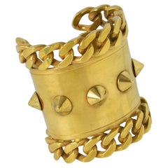 Givenchy Paris Brazalete de cadenas doradas y tachuelas