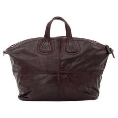 Cartera Nightingale de charol Givenchy