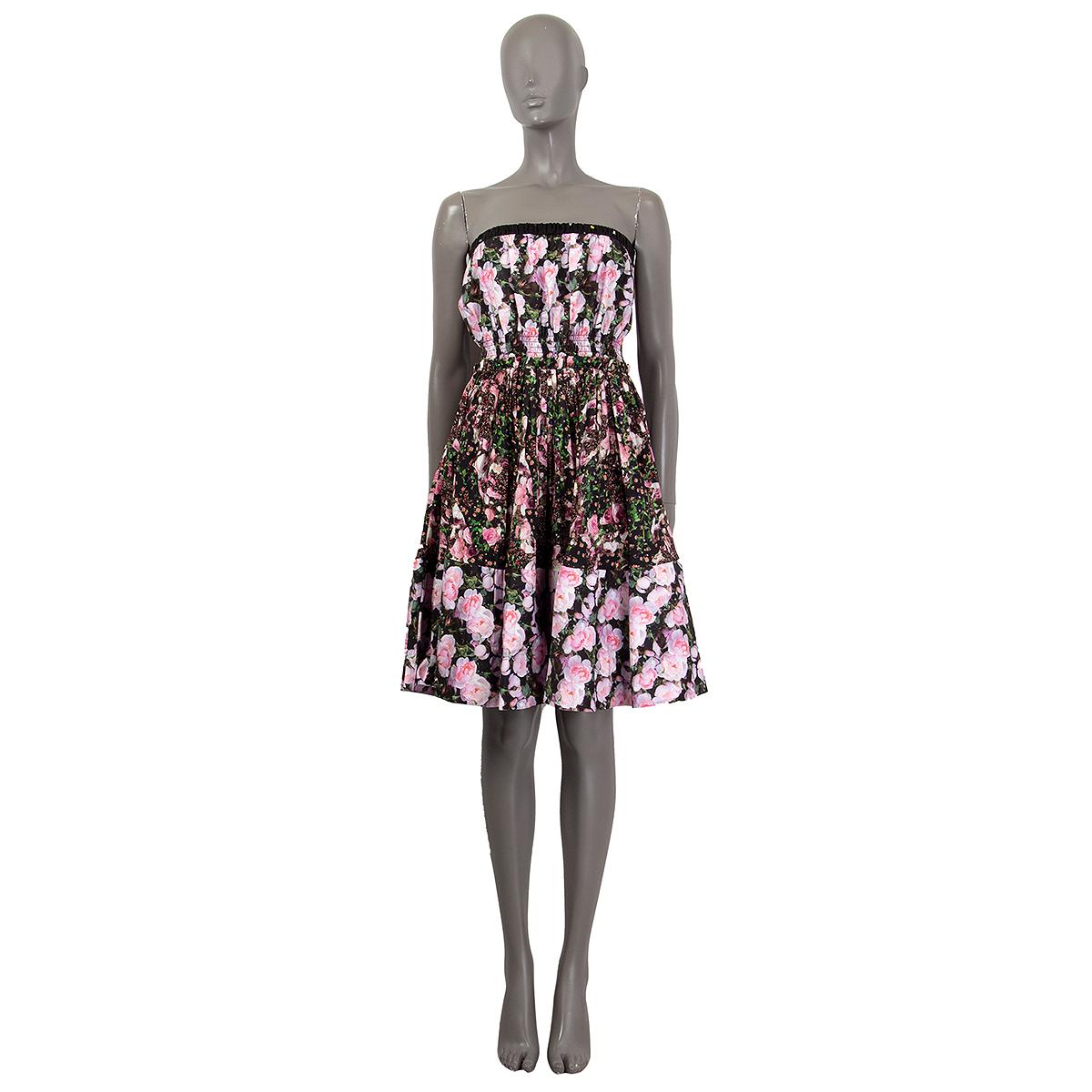 100% authentic Givenchy floral pleated skirt strapless dress in pink, black, green, rose and lilac cotton (100%). Closes on the side with a zipper. Partially lined with second application in multi-color polyamide (66%) and silk (34%). Has been worn