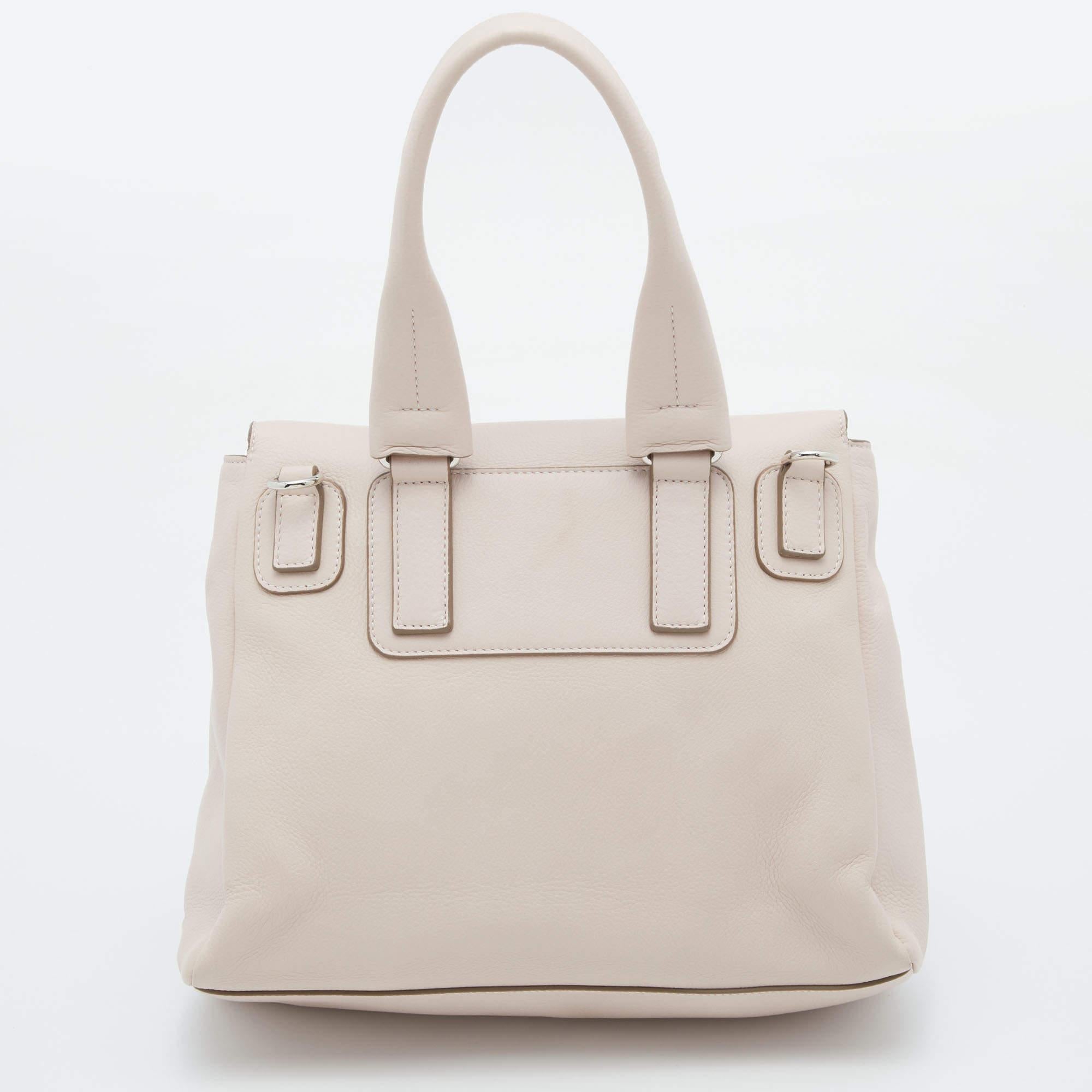 Designer bags are ideal companions for ample of occasions! Here we have a fashion-meets-functionality piece crafted with precision. It has been equipped with a well-sized interior that can easily fit in all your essentials.

Includes: Original