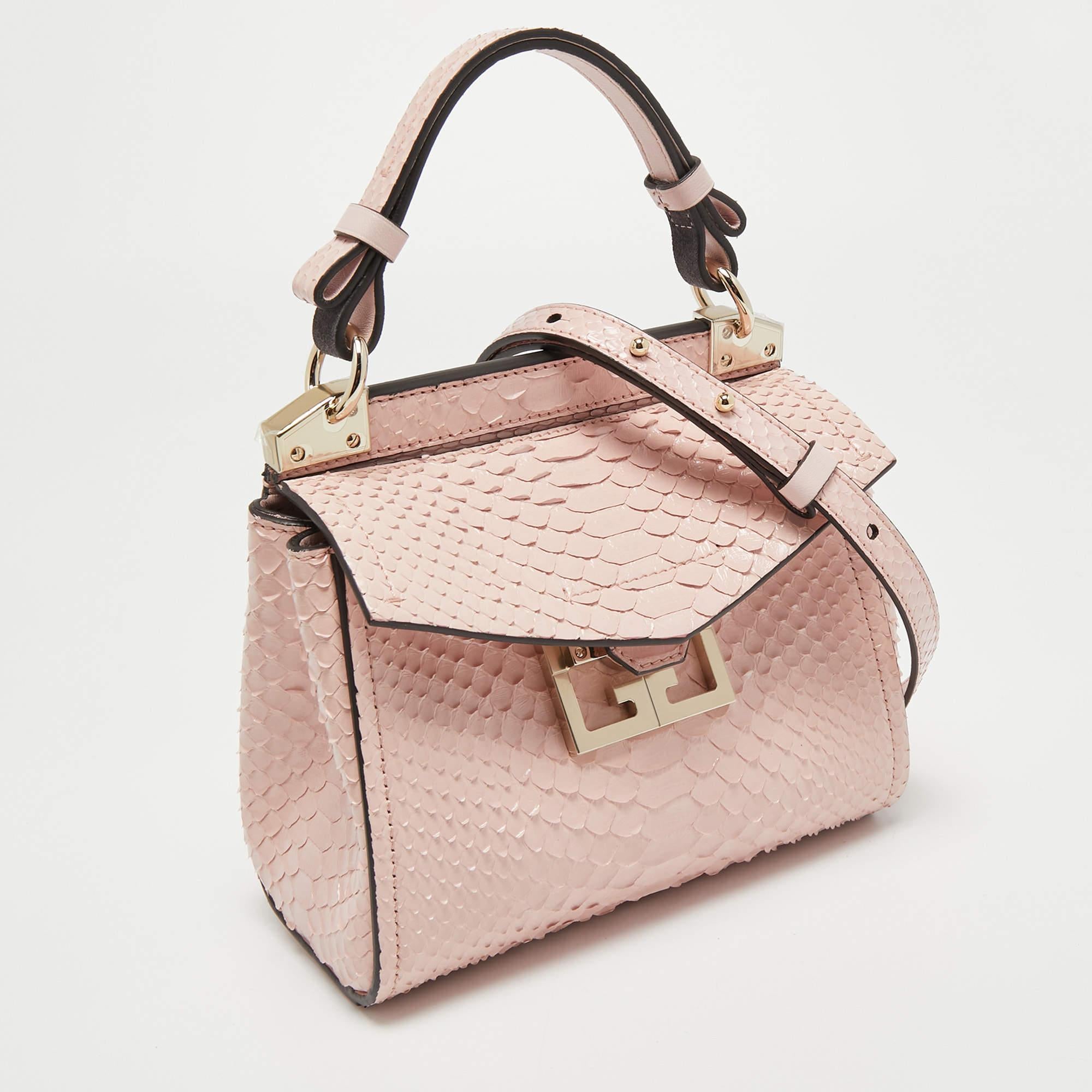 Exuding unparalleled elegance and sophistication, this bag is made from the finest material in a gorgeous hue. While the roomy interior offers ample space, the top handle allows you to carry it with much elegance.

